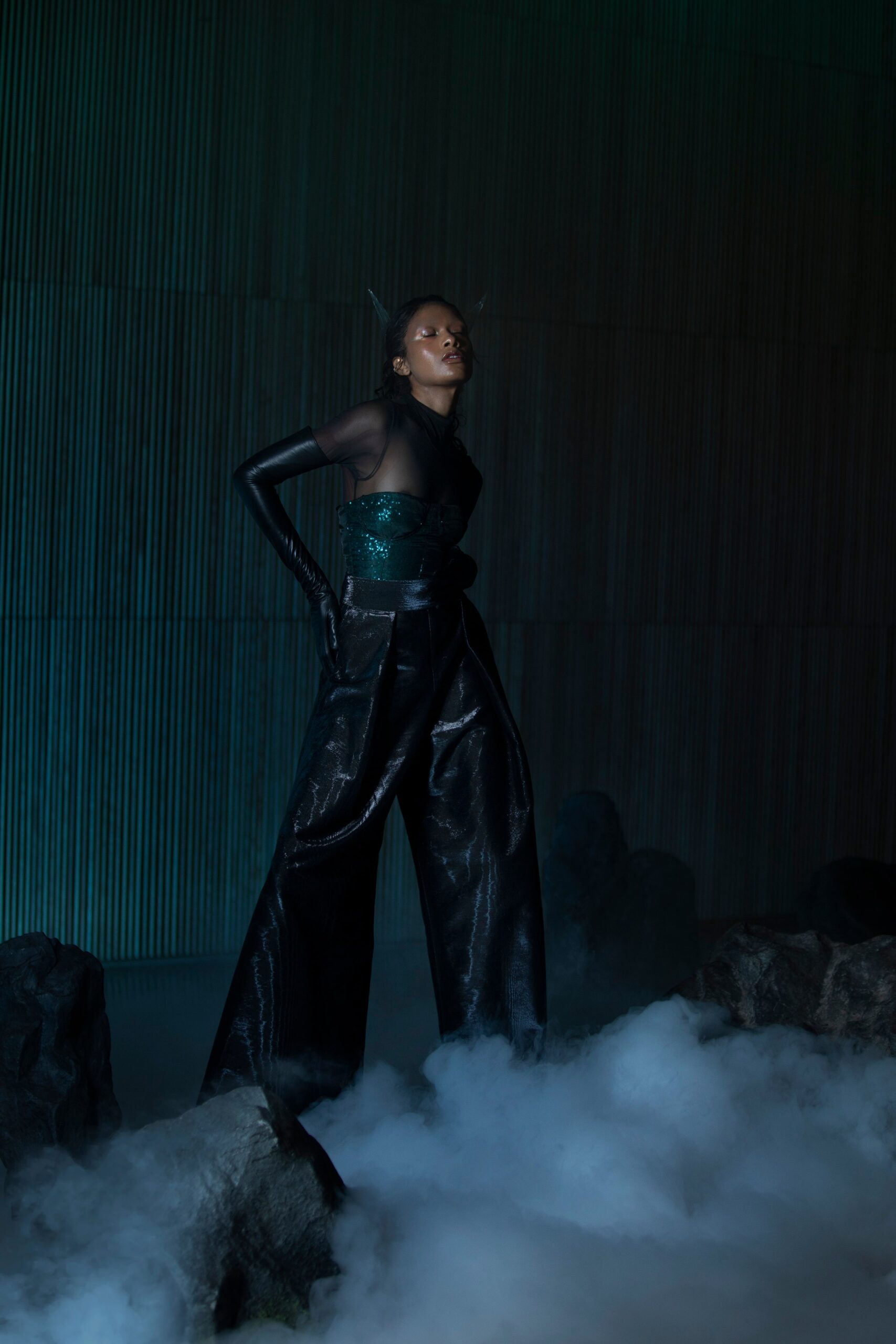 black leather wide-leg pants and teal top