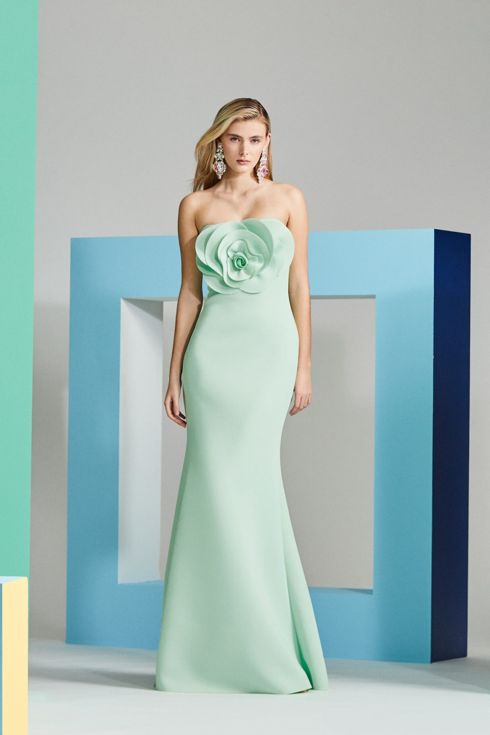 green strapless flared gown
