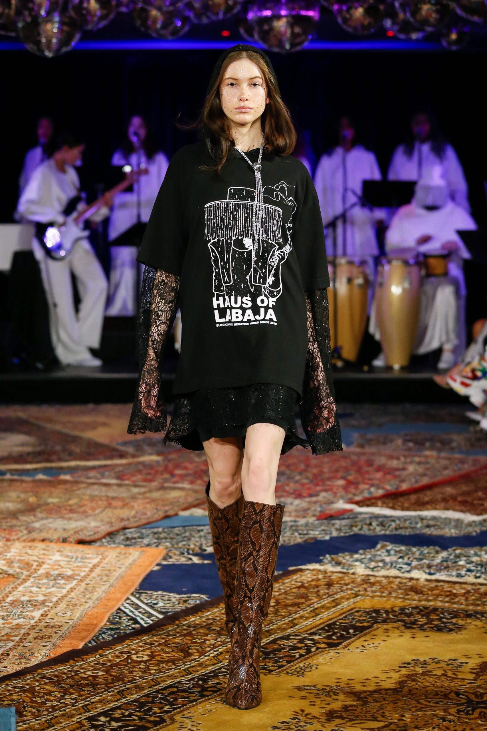 black printed mini dress with brown boots