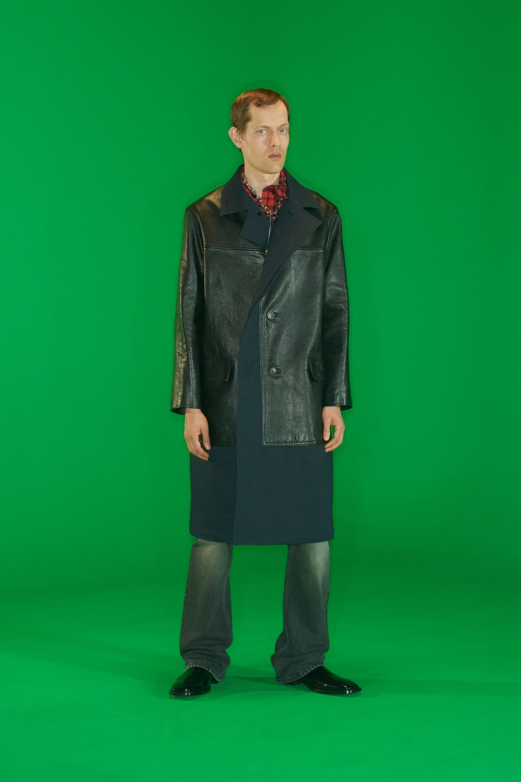 black leather long-sleeve collared relaxed buttoned coat