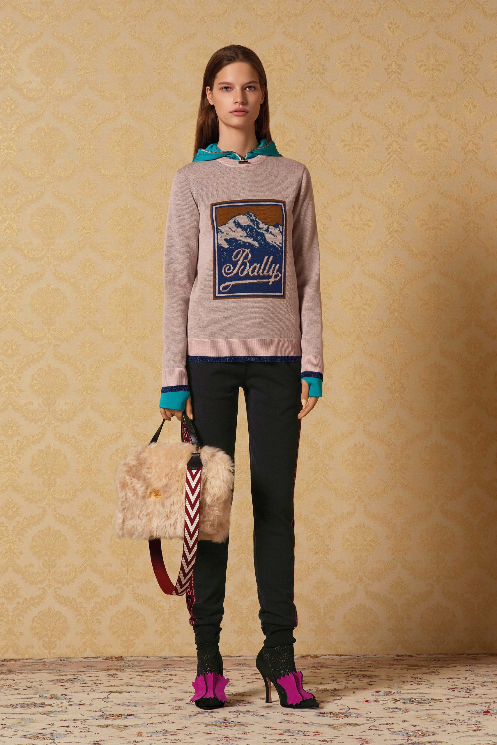 beige hooded sweater with black pants