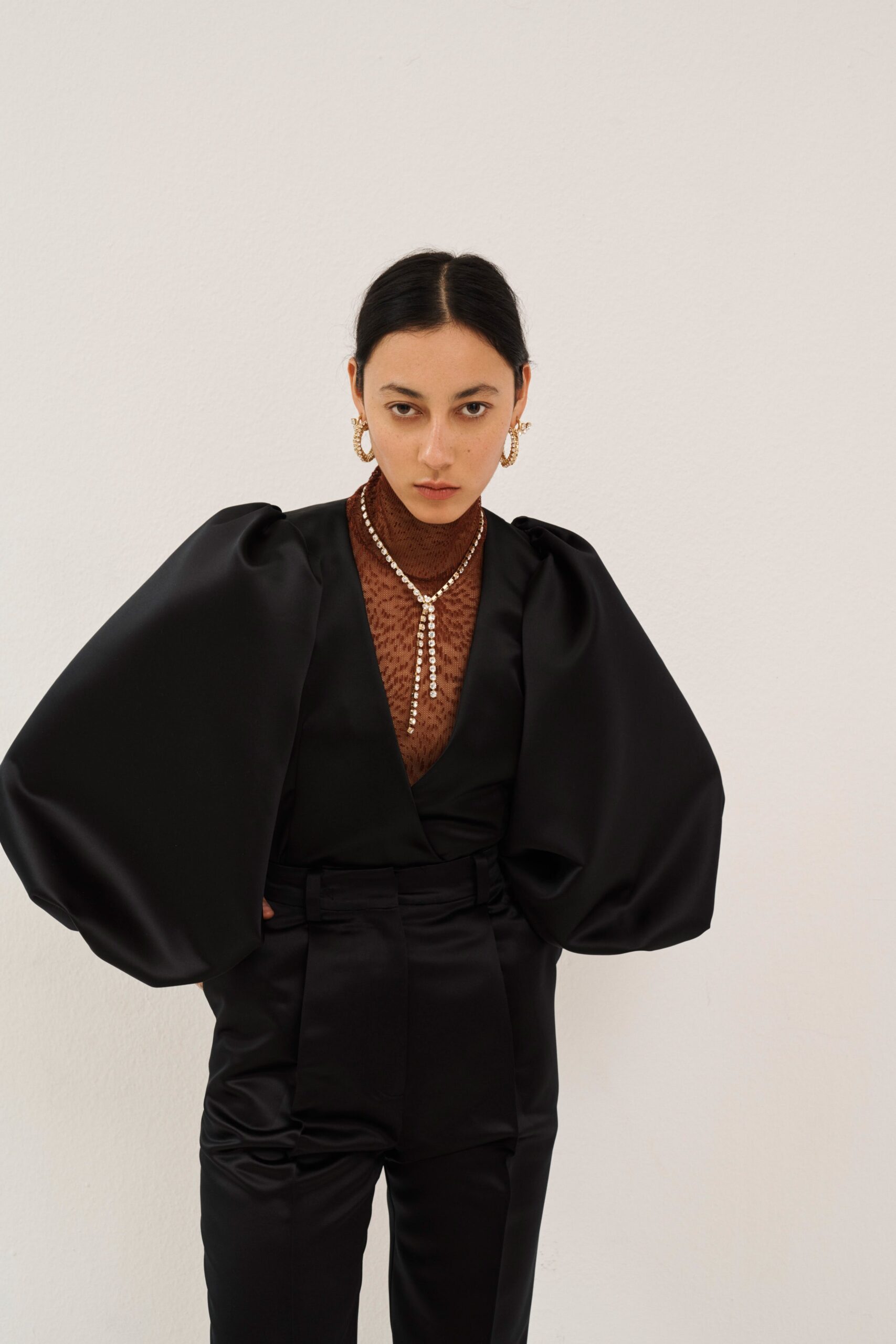 black satin long-sleeve v-neck draped shiny blouse
