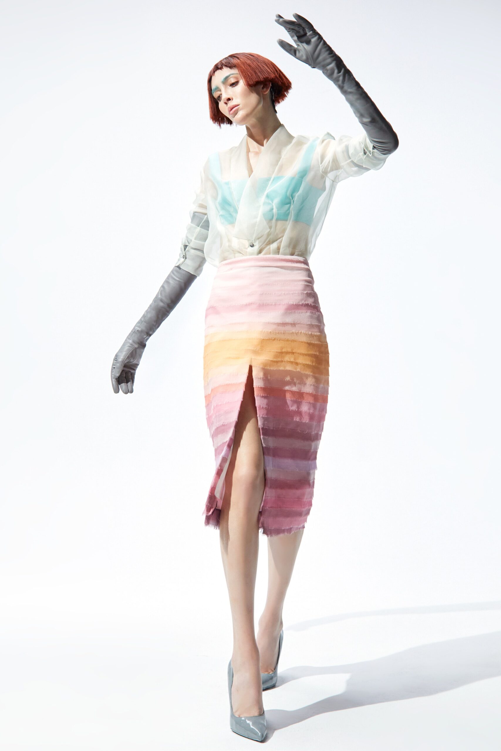 sheer blouse with tiered midi skirt