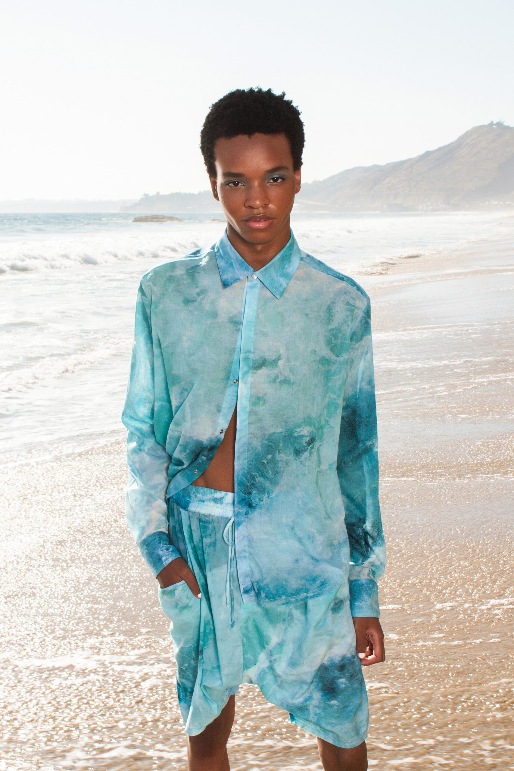 blue printed shirt and shorts