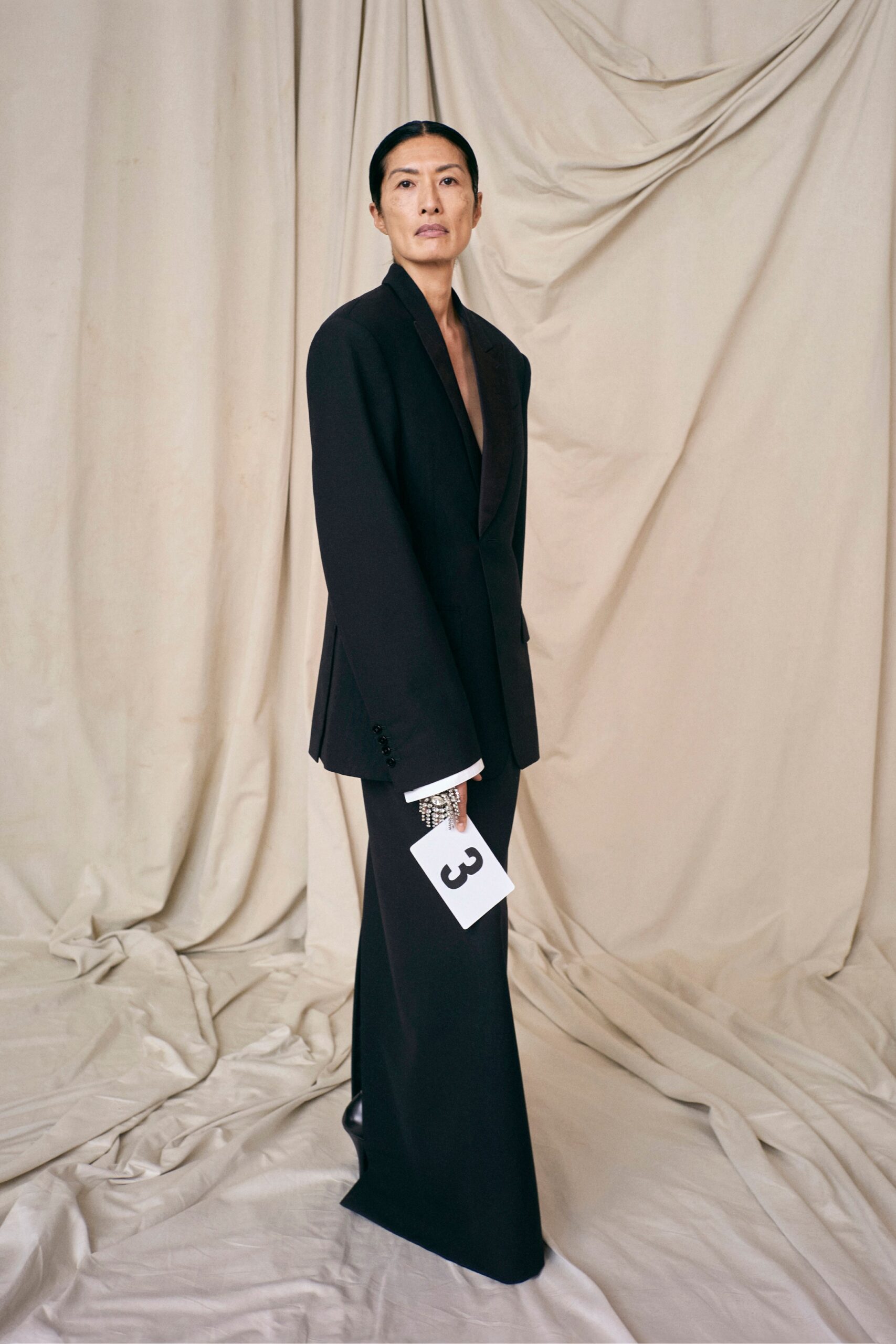 black tailored blazer and midi skirt