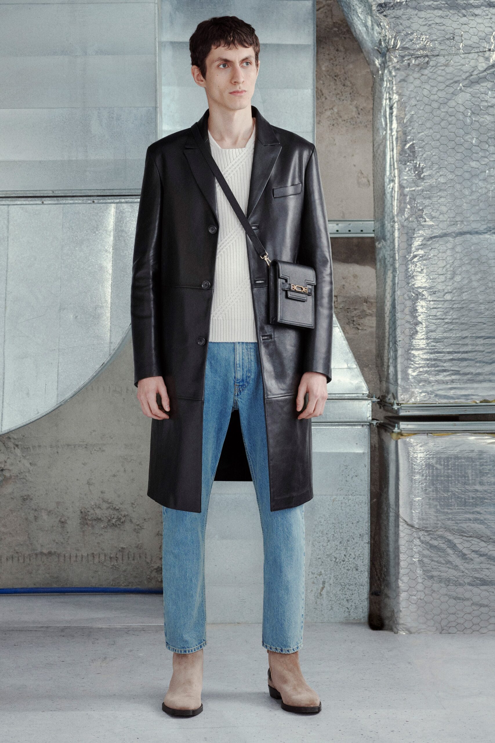 black leather coat with white sweater
