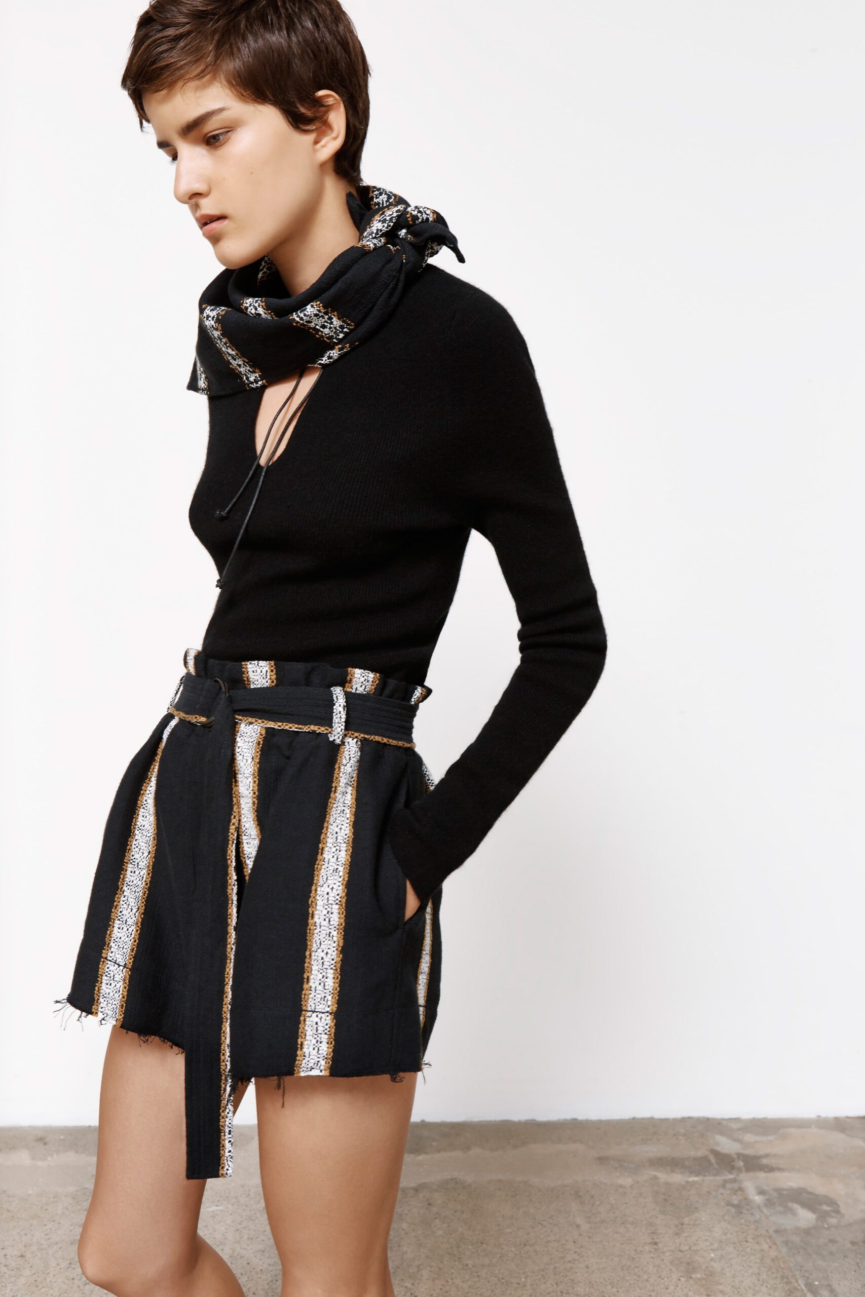 black fitted top with high-waisted shorts