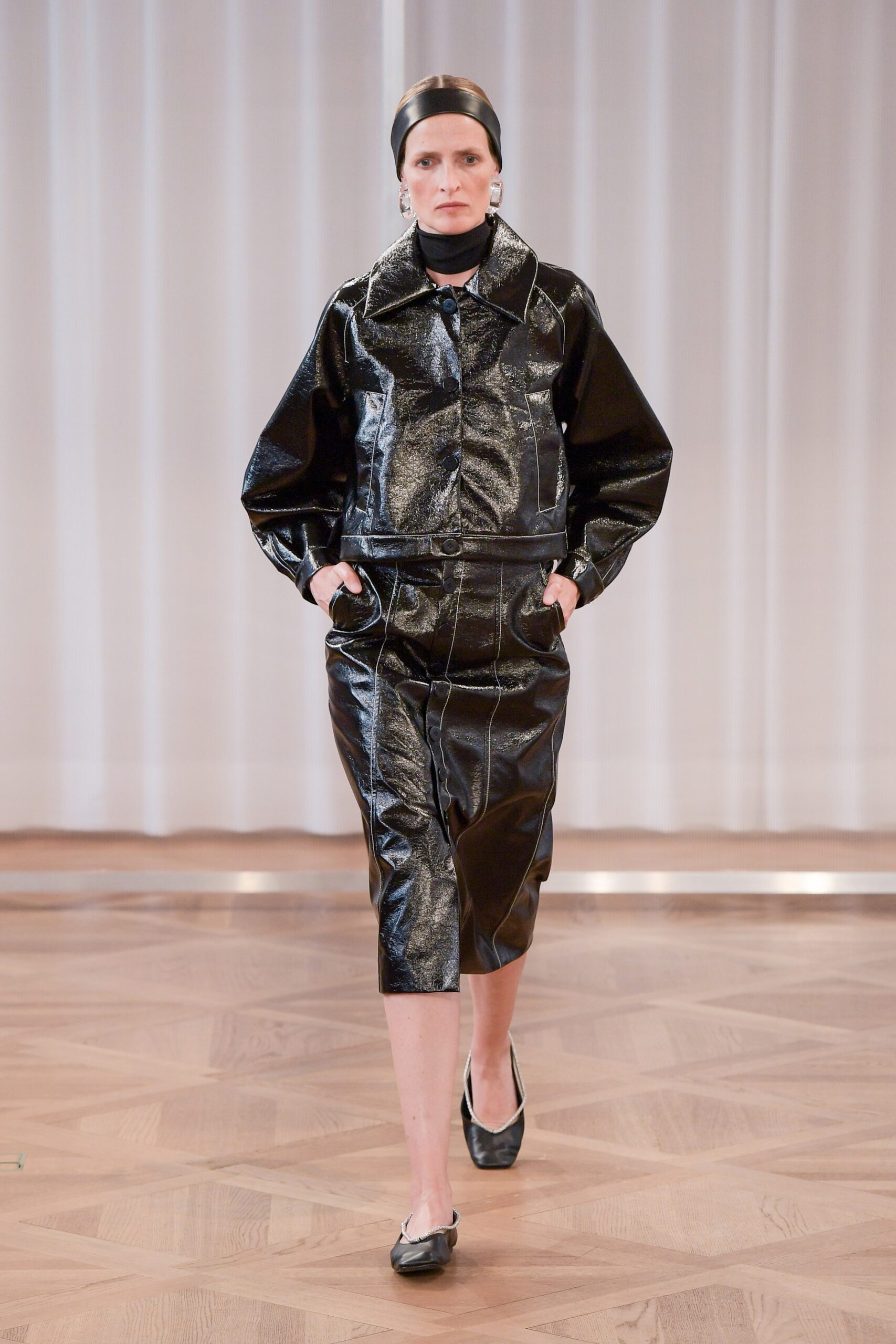 black vinyl fitted jacket and skirt