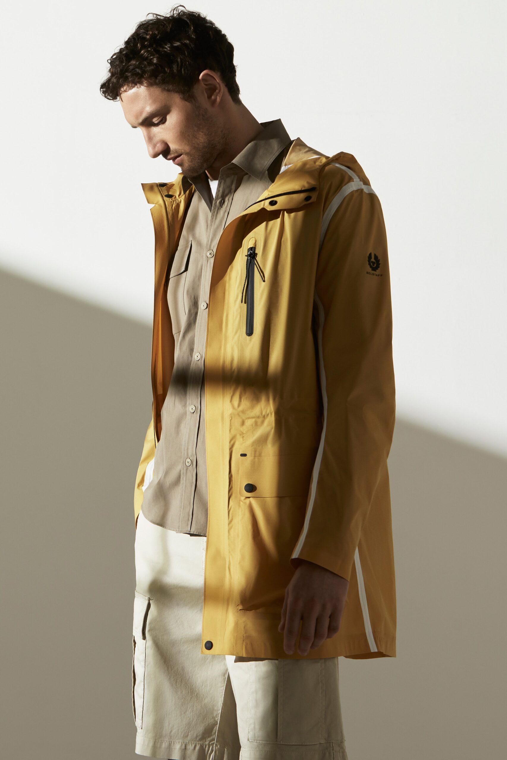 yellow nylon hooded long-sleeve relaxed zippered pockets parka