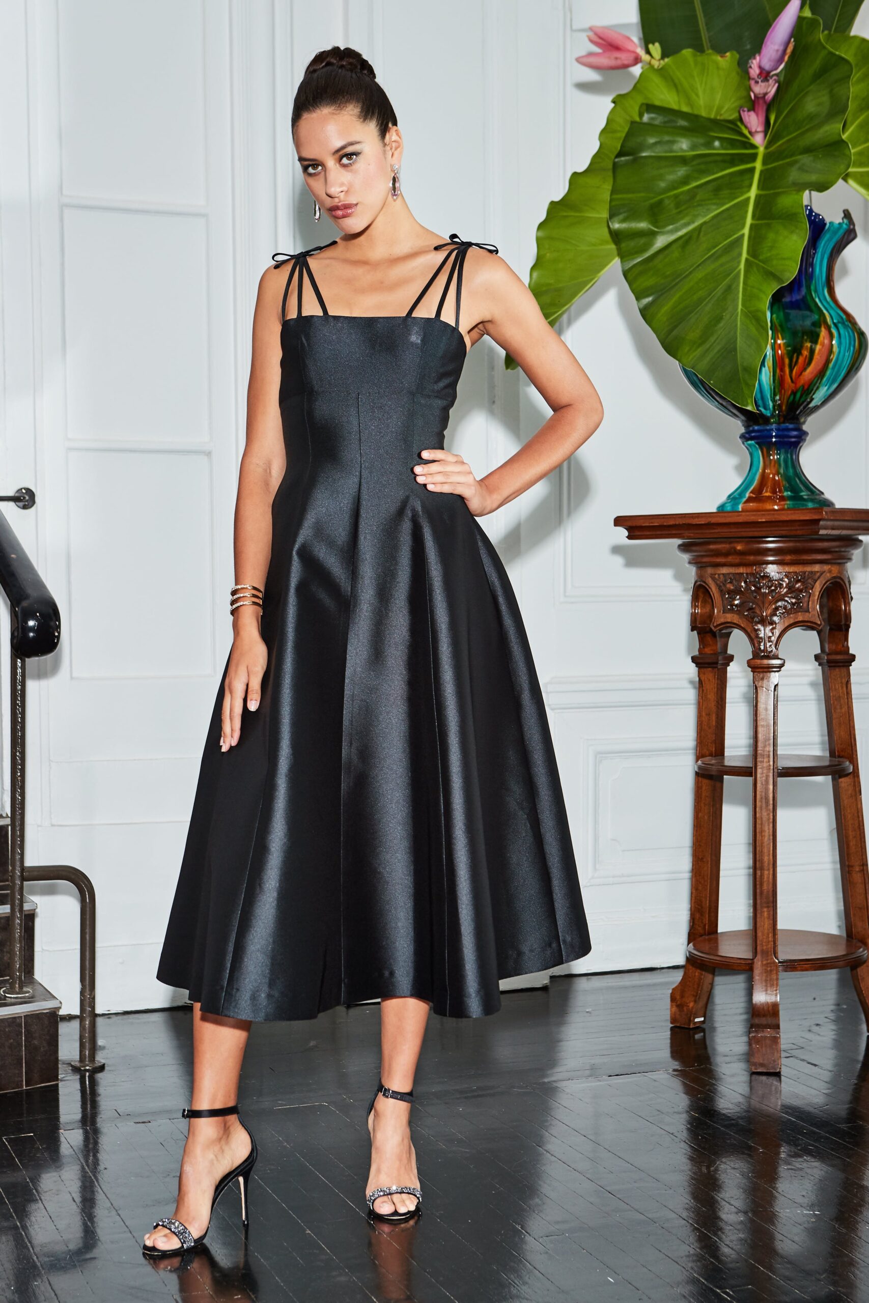 black silk midi dress with strappy shoes