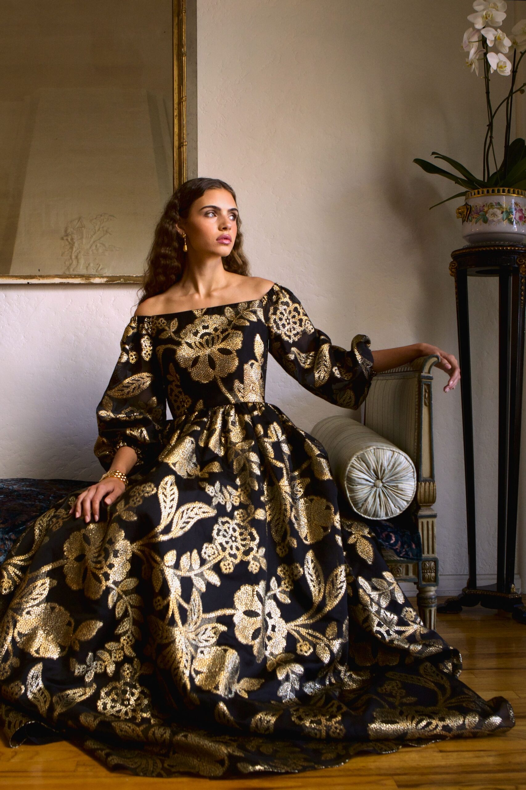 black and gold embroidered gown