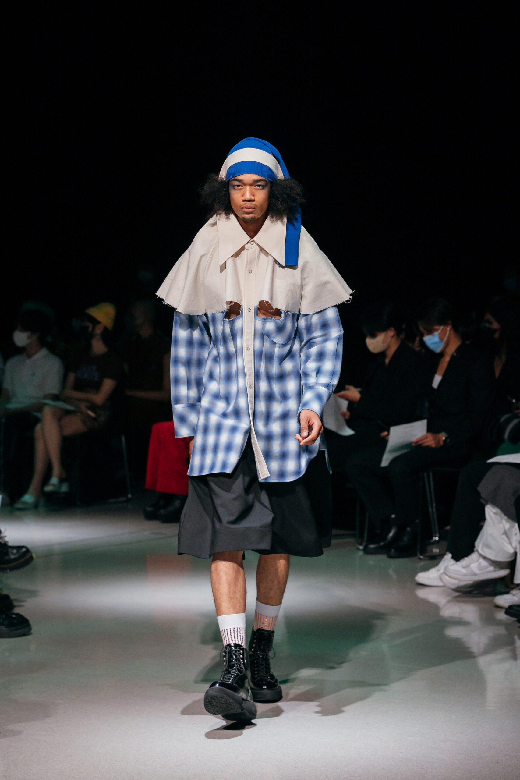 blue and white checked shirt with cape