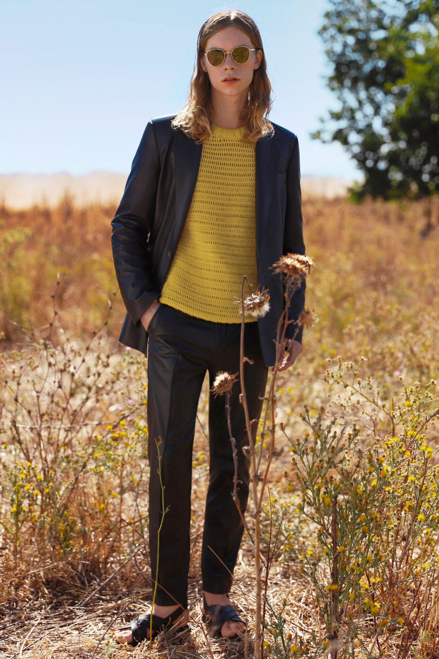 black leather blazer with yellow knit top