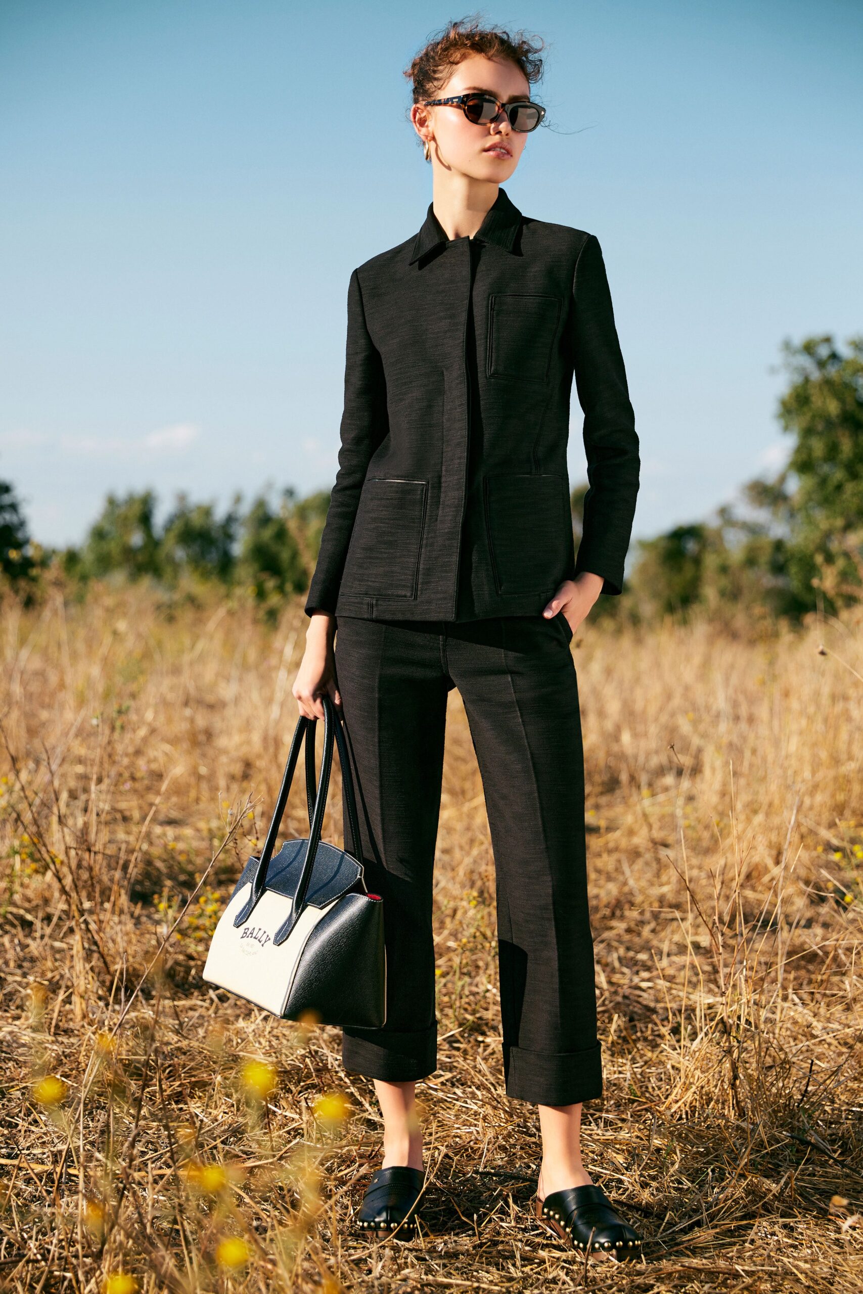 black tailored blazer and relaxed pants