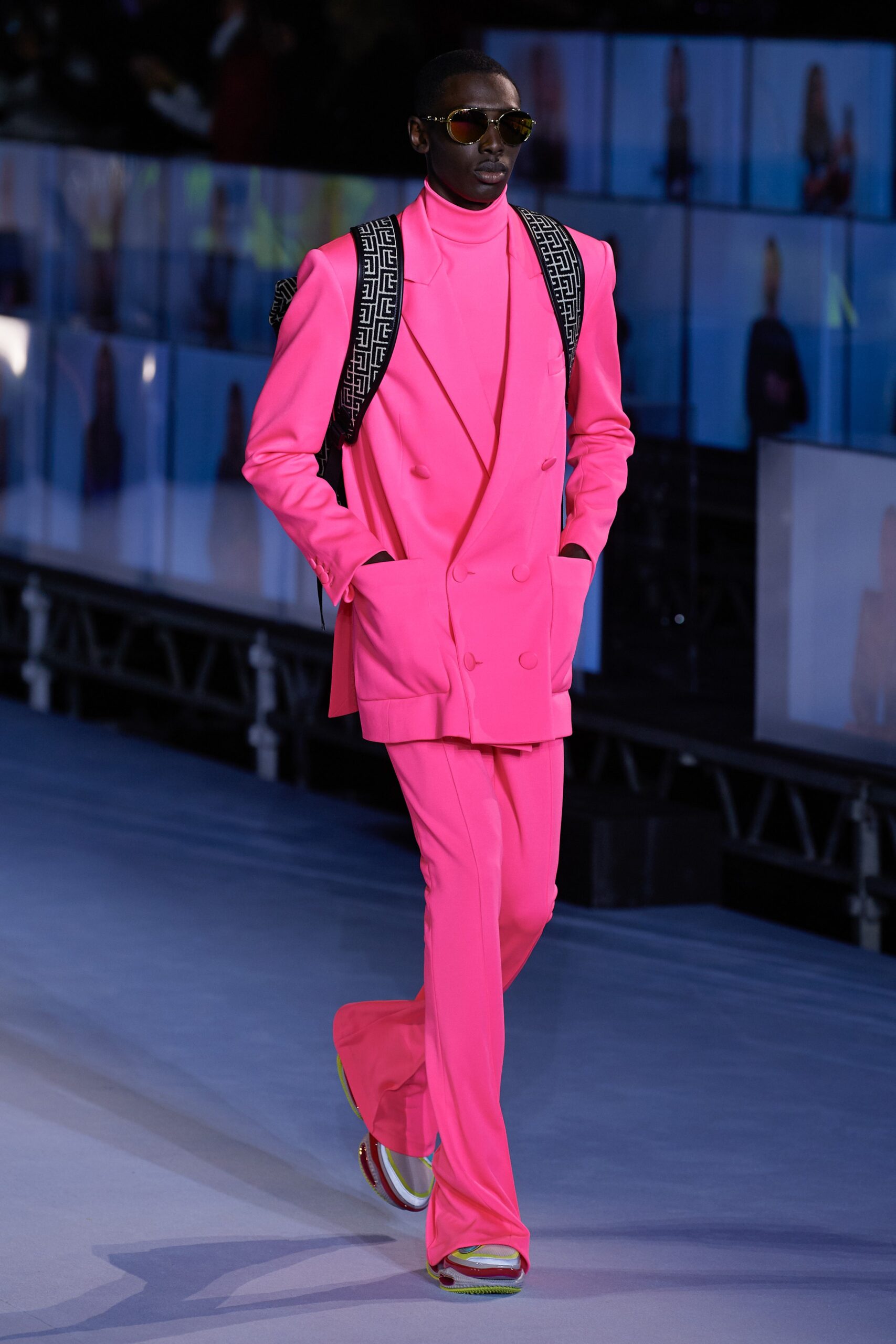 pink tailored suit with multi shoes