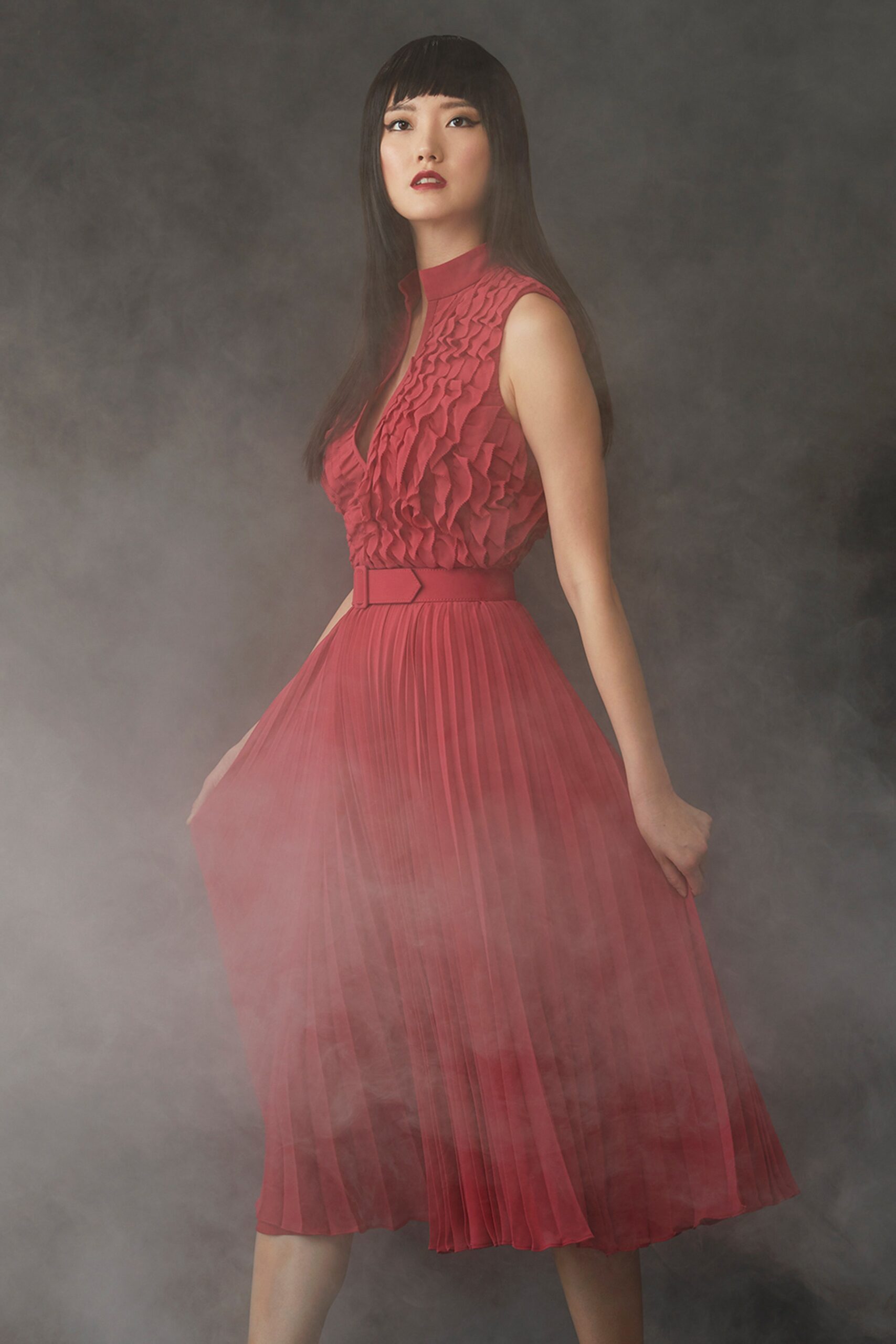 red pleated sleeveless dress