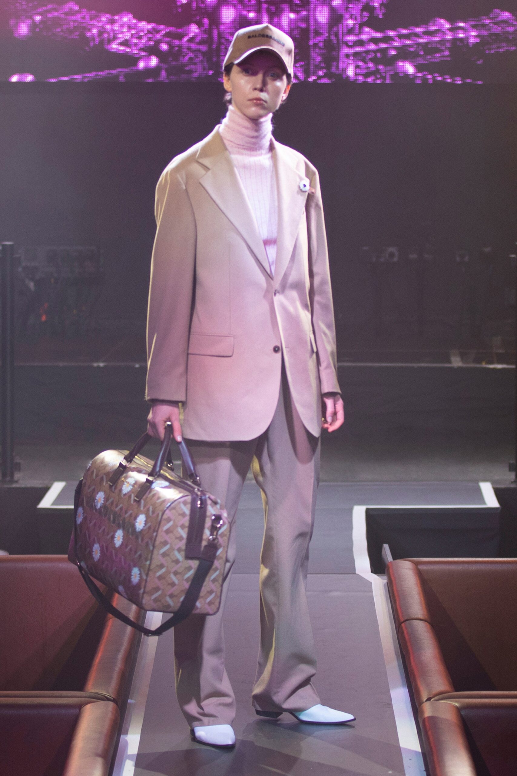 beige tailored suit with white top