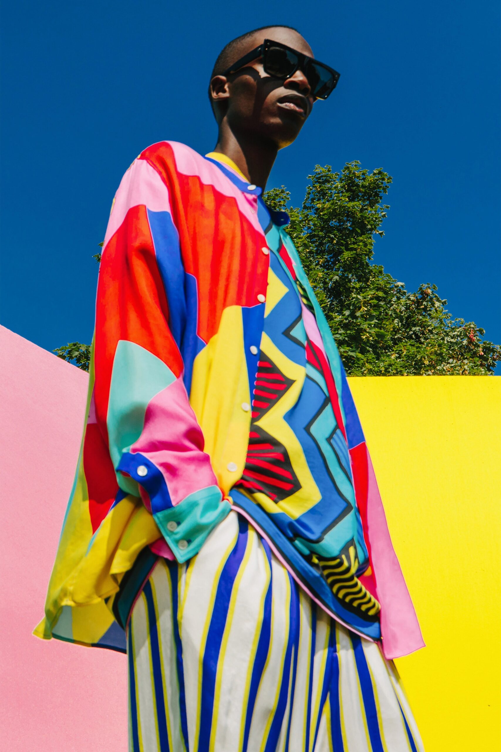 colorful shirt and striped pants