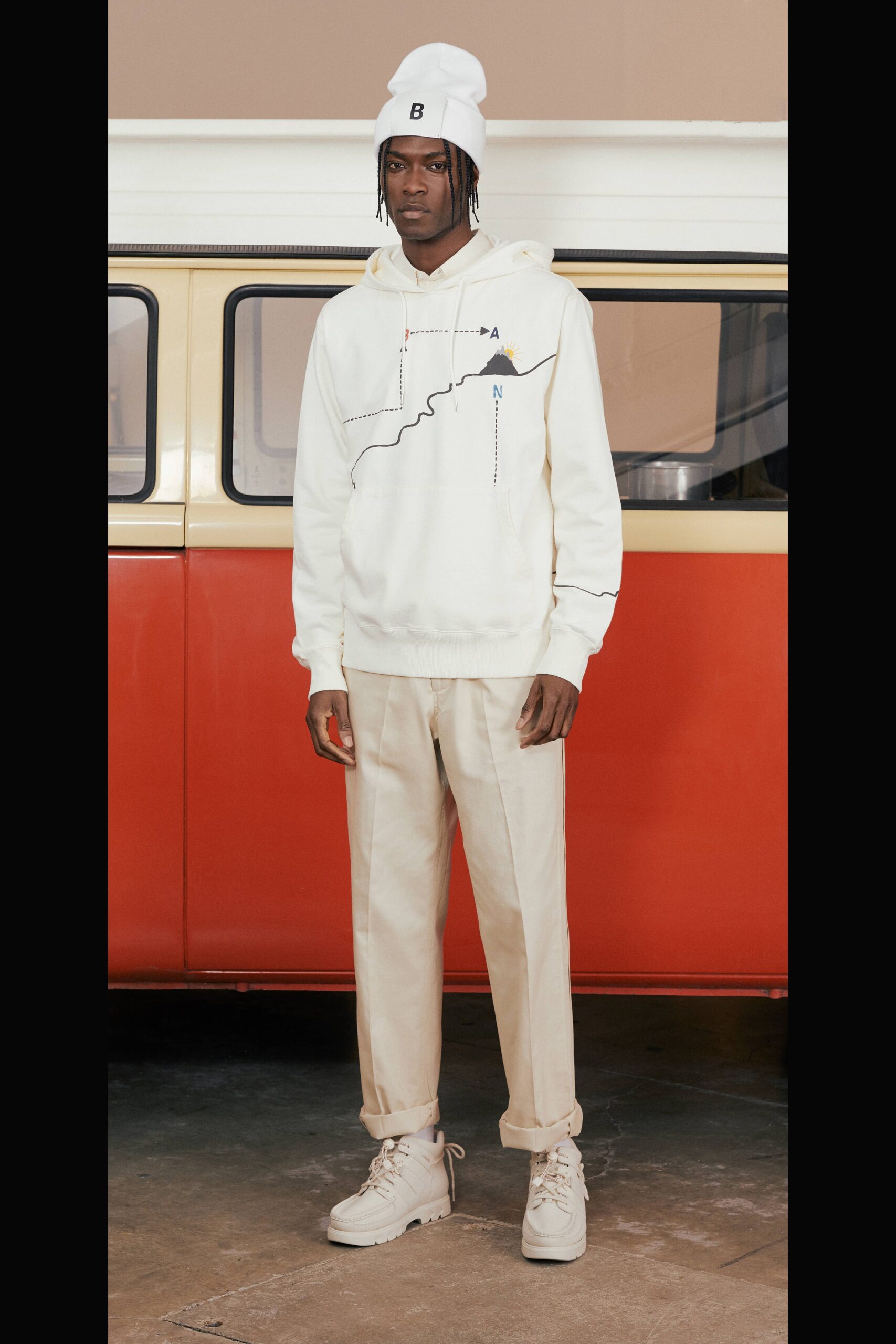 white hoodie with beige pants