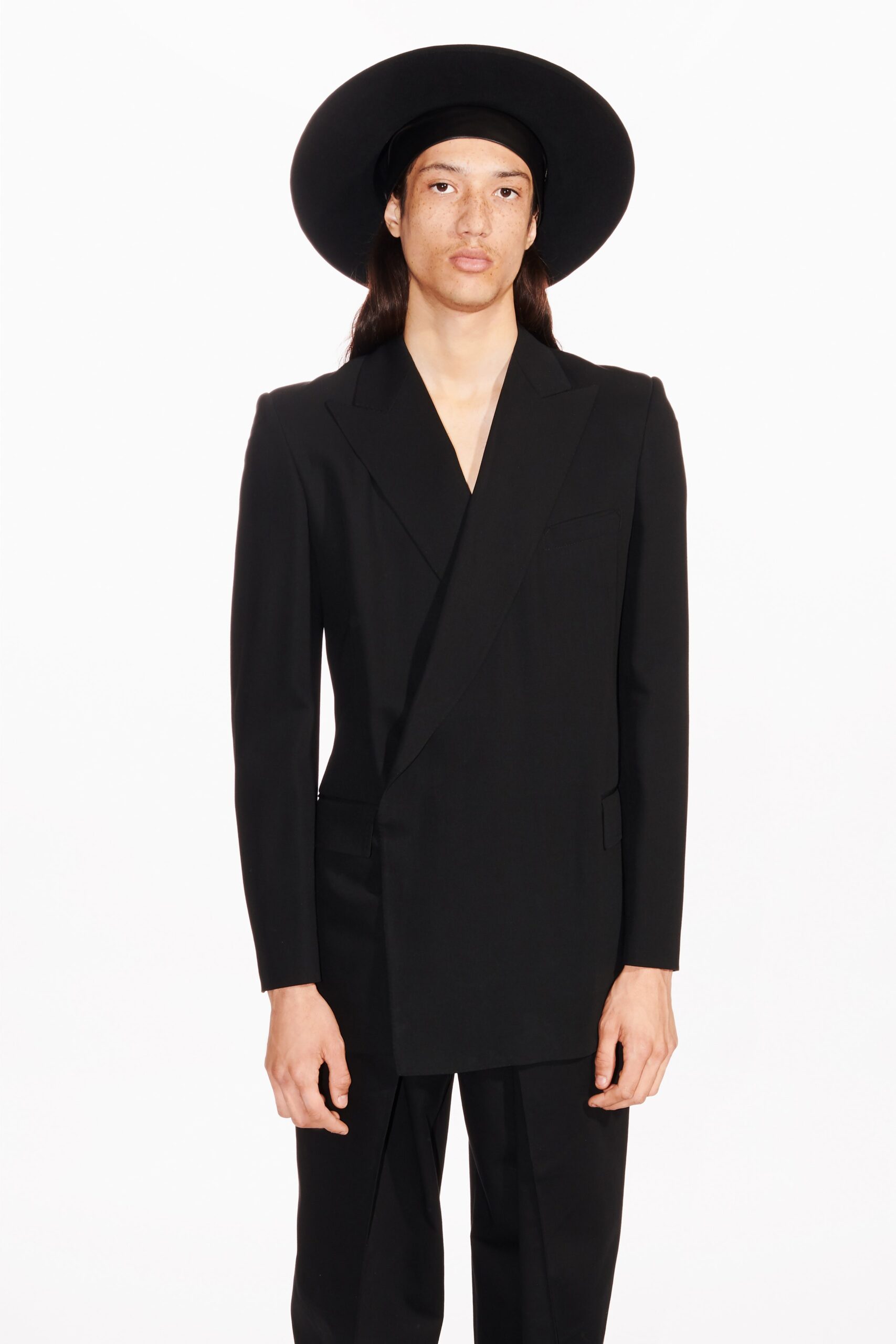 black tailored blazer and hat
