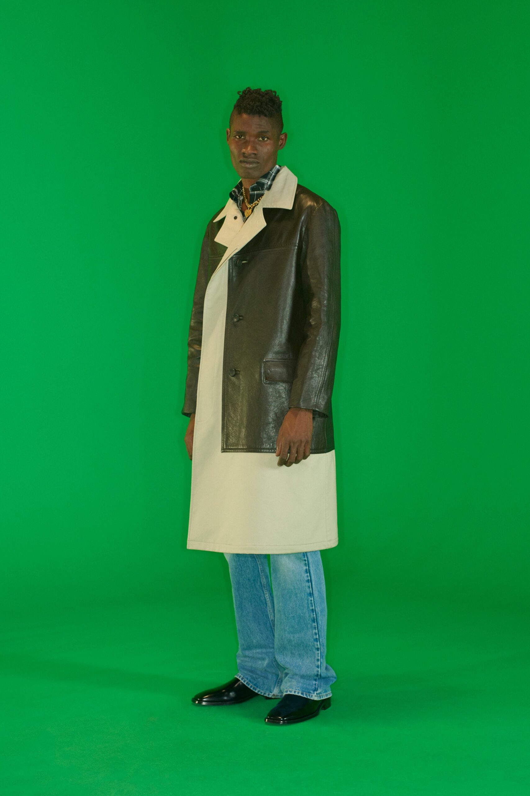black leather long-sleeve collared fitted buttoned color-blocked coat