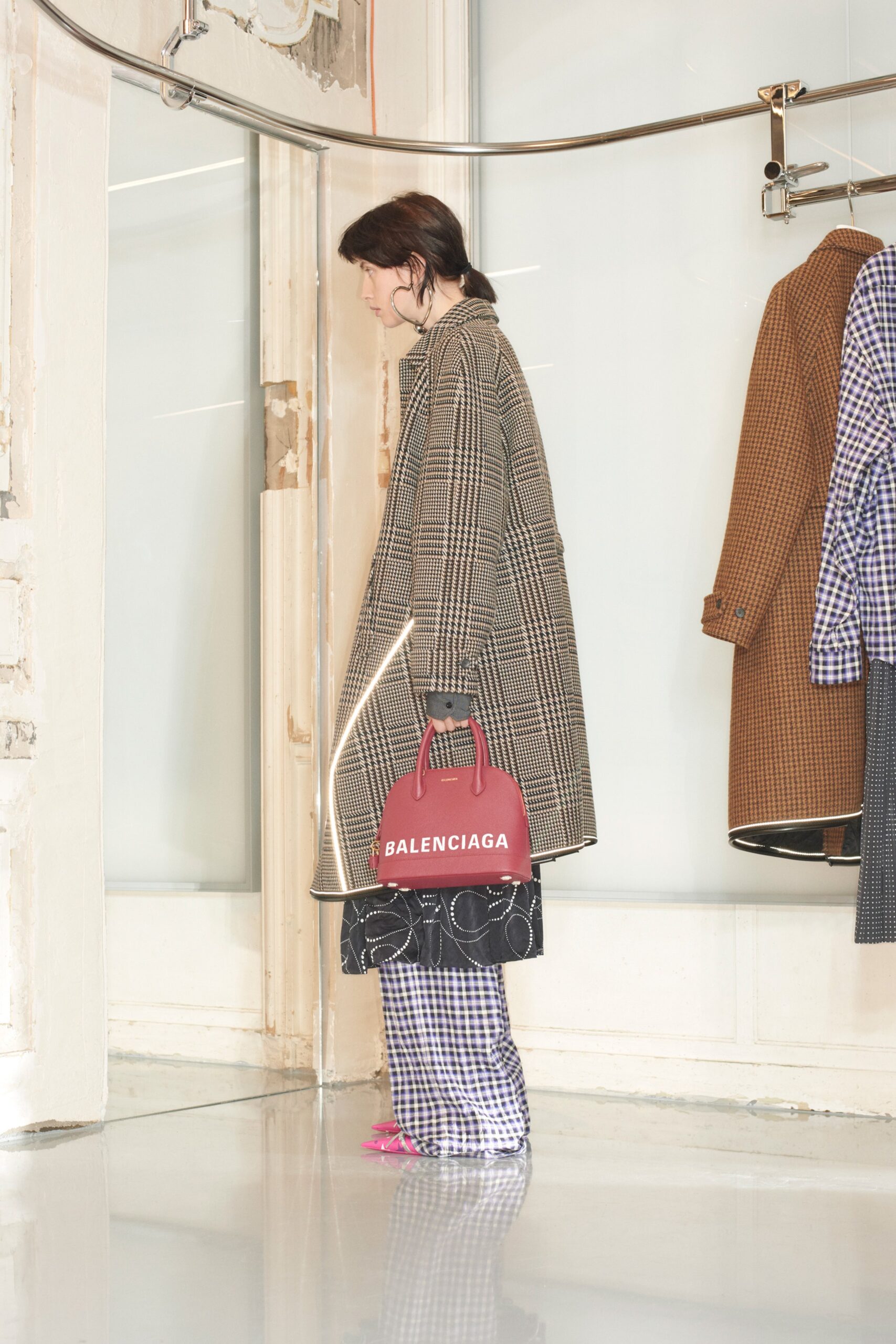 brown checked coat with black pants