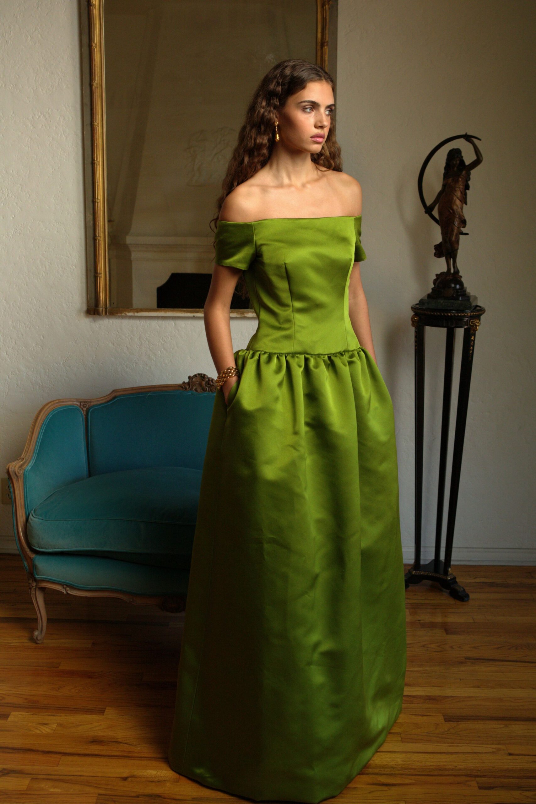 green silk off-shoulder gown