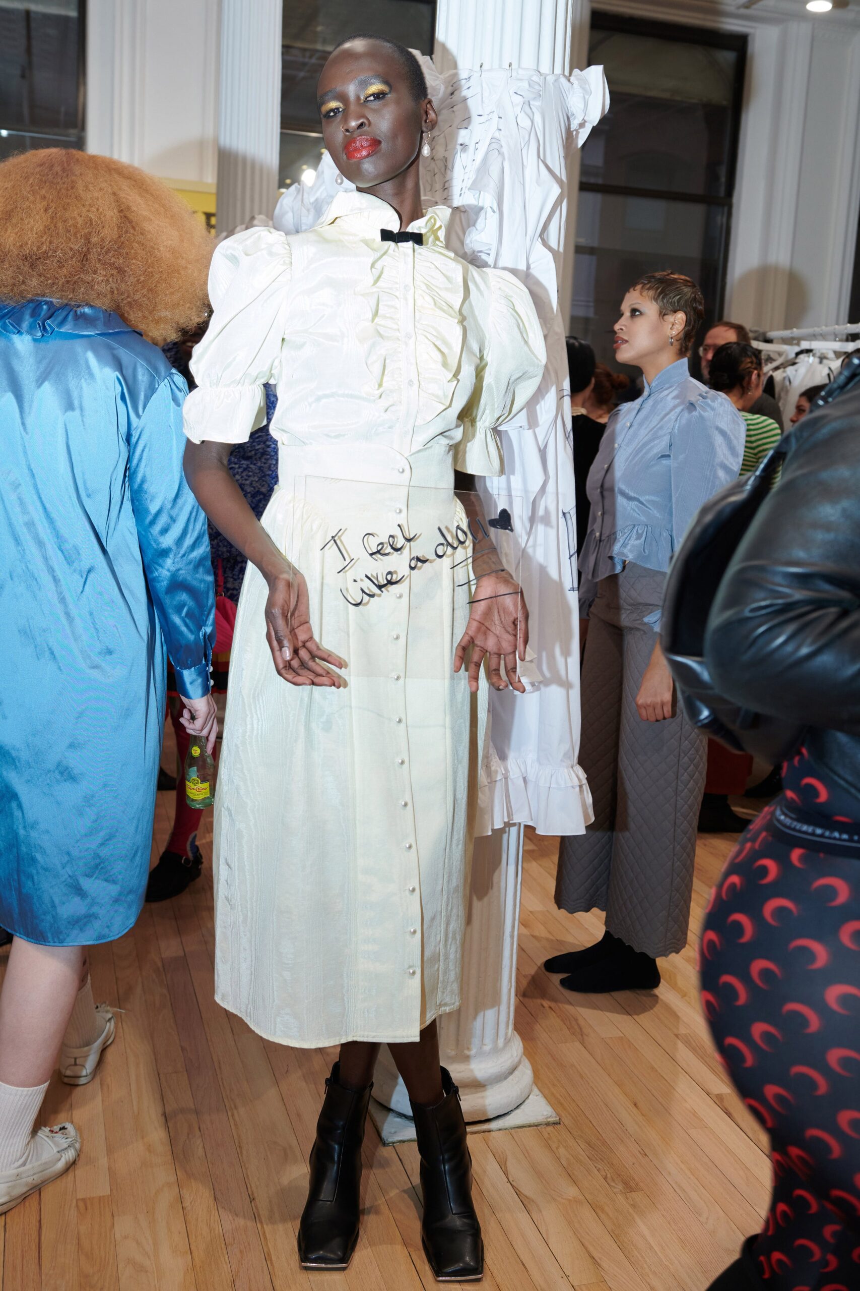 white fitted midi dress with boots