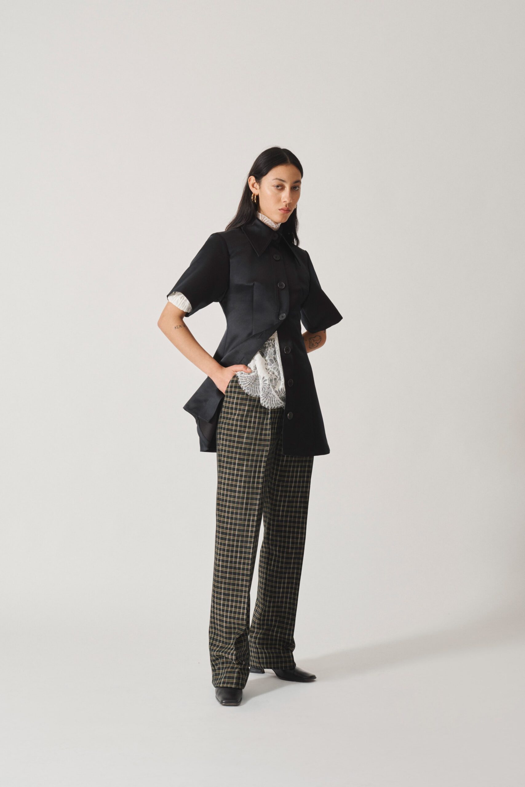 black asymmetric short-sleeve jacket