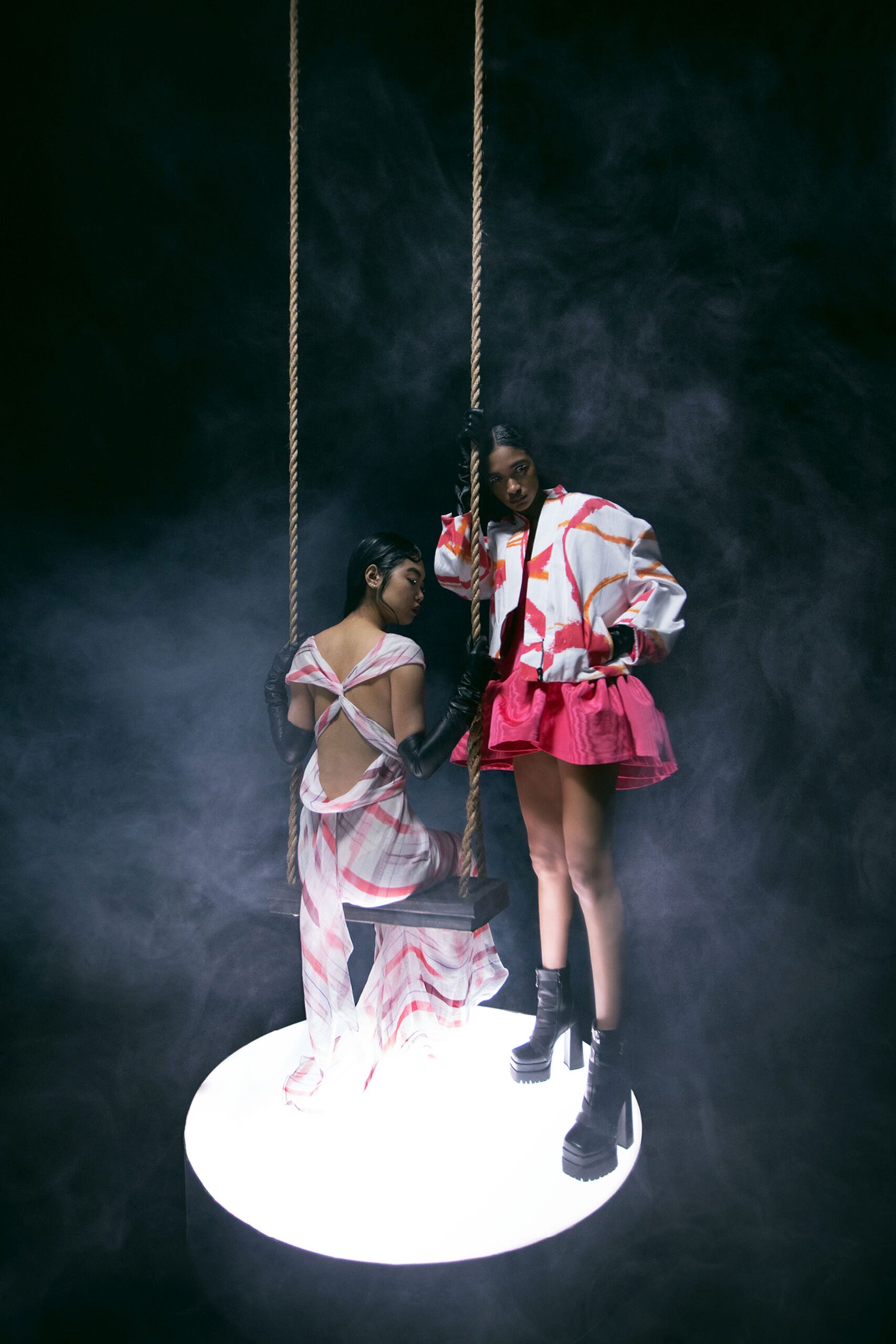 pink and white flared dress with relaxed jacket