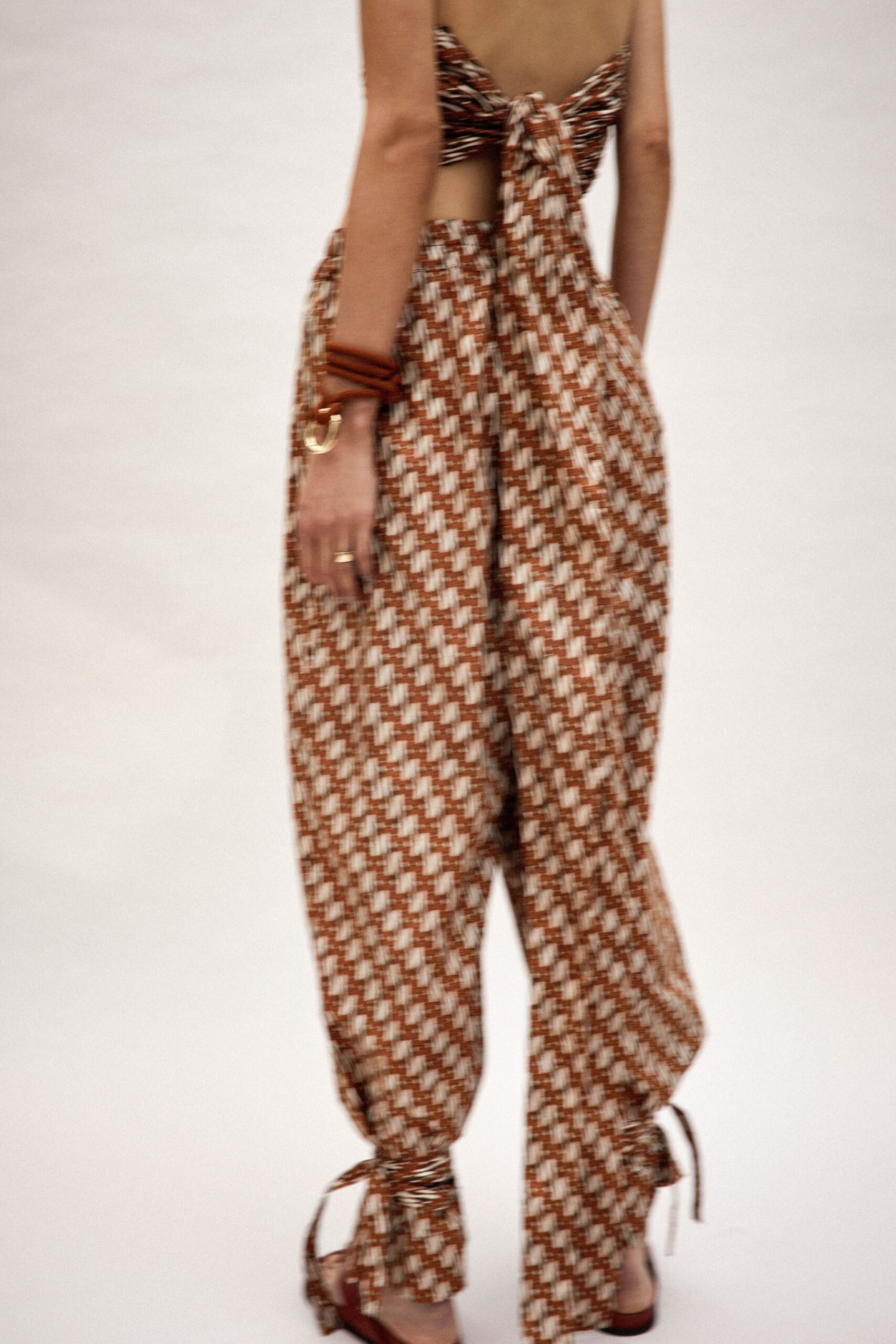 brown and white printed top and pants