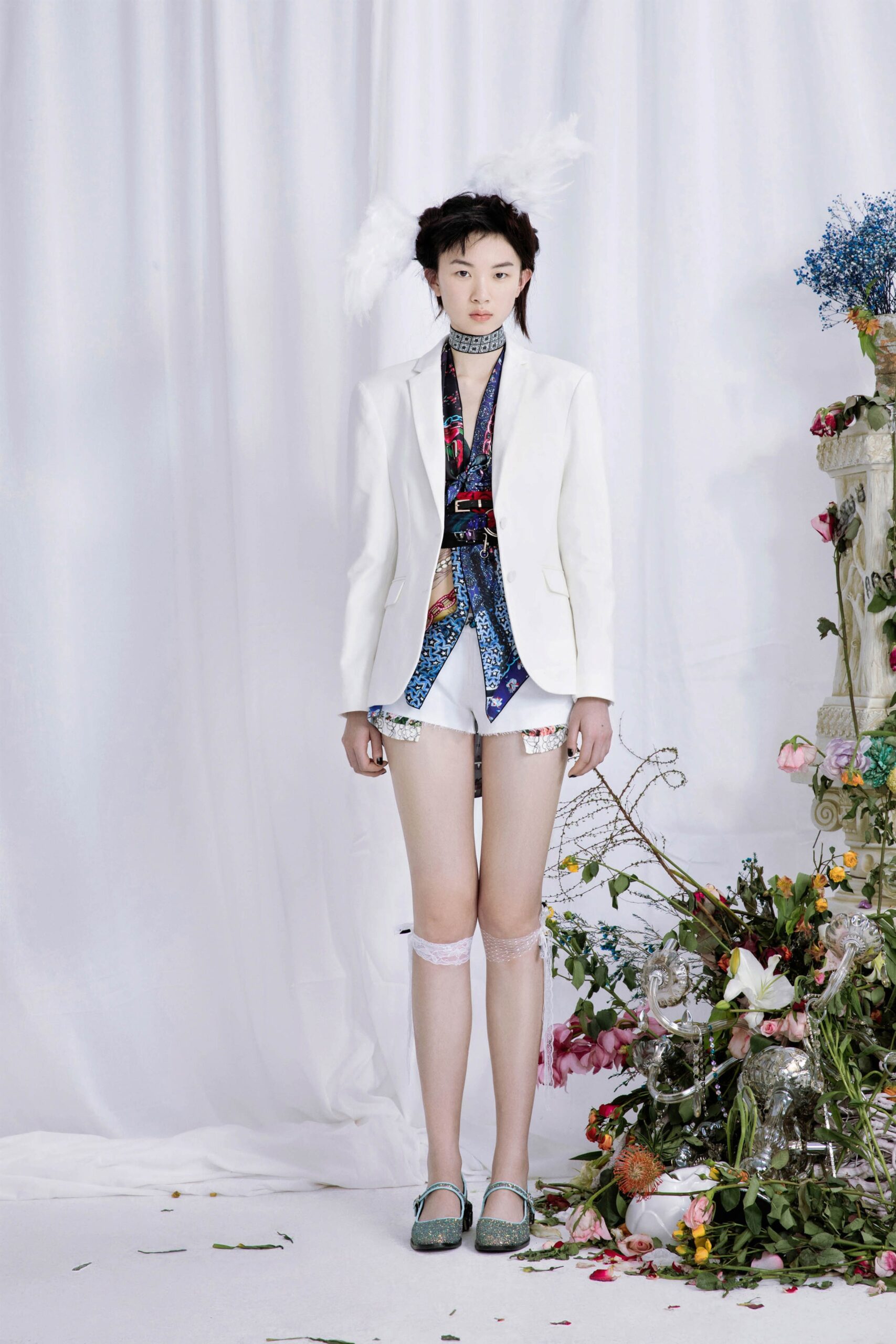 white tailored blazer with multi shirt