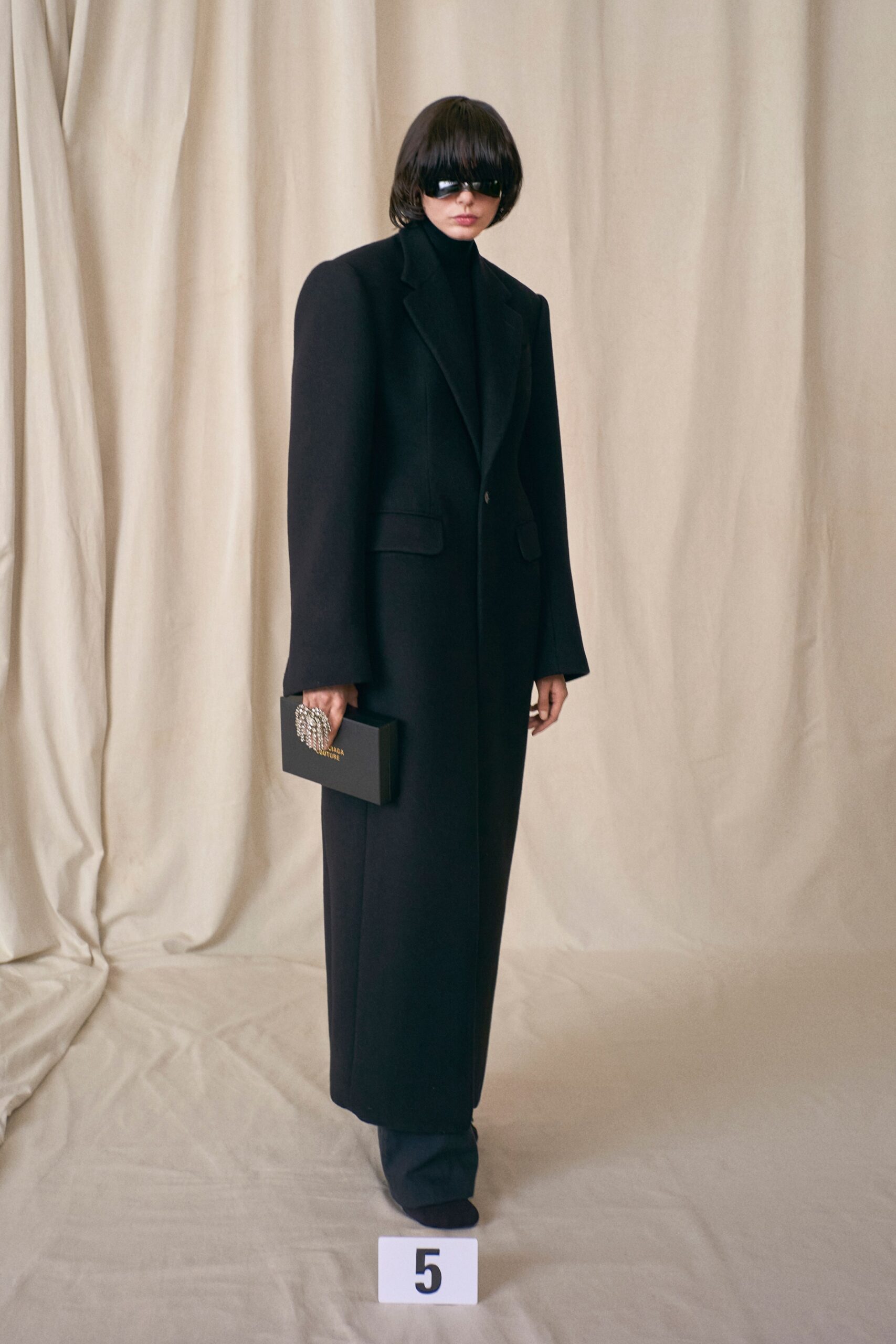 black wool long-sleeve collared oversized buttoned maxi coat