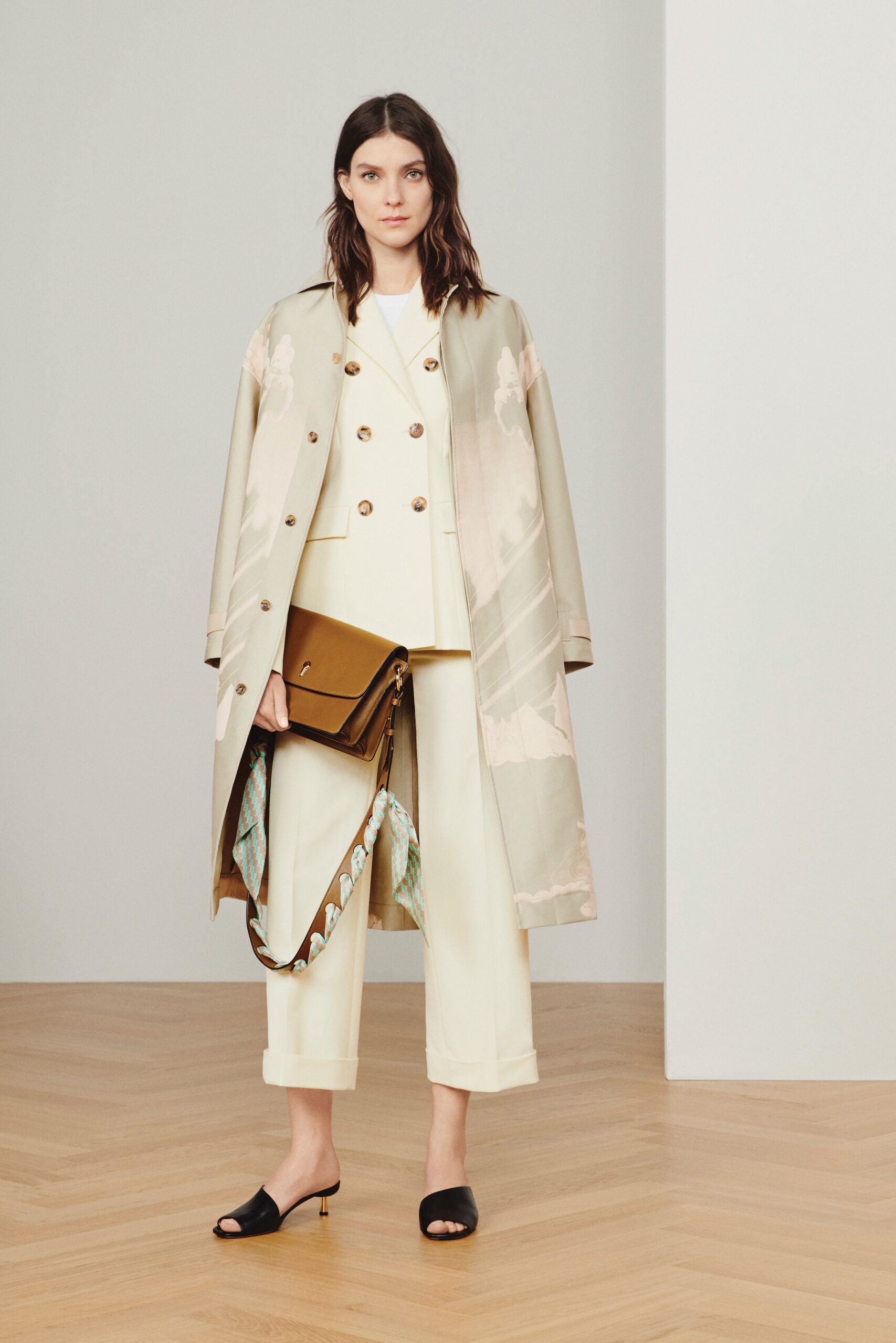 beige silk coat with white blazer