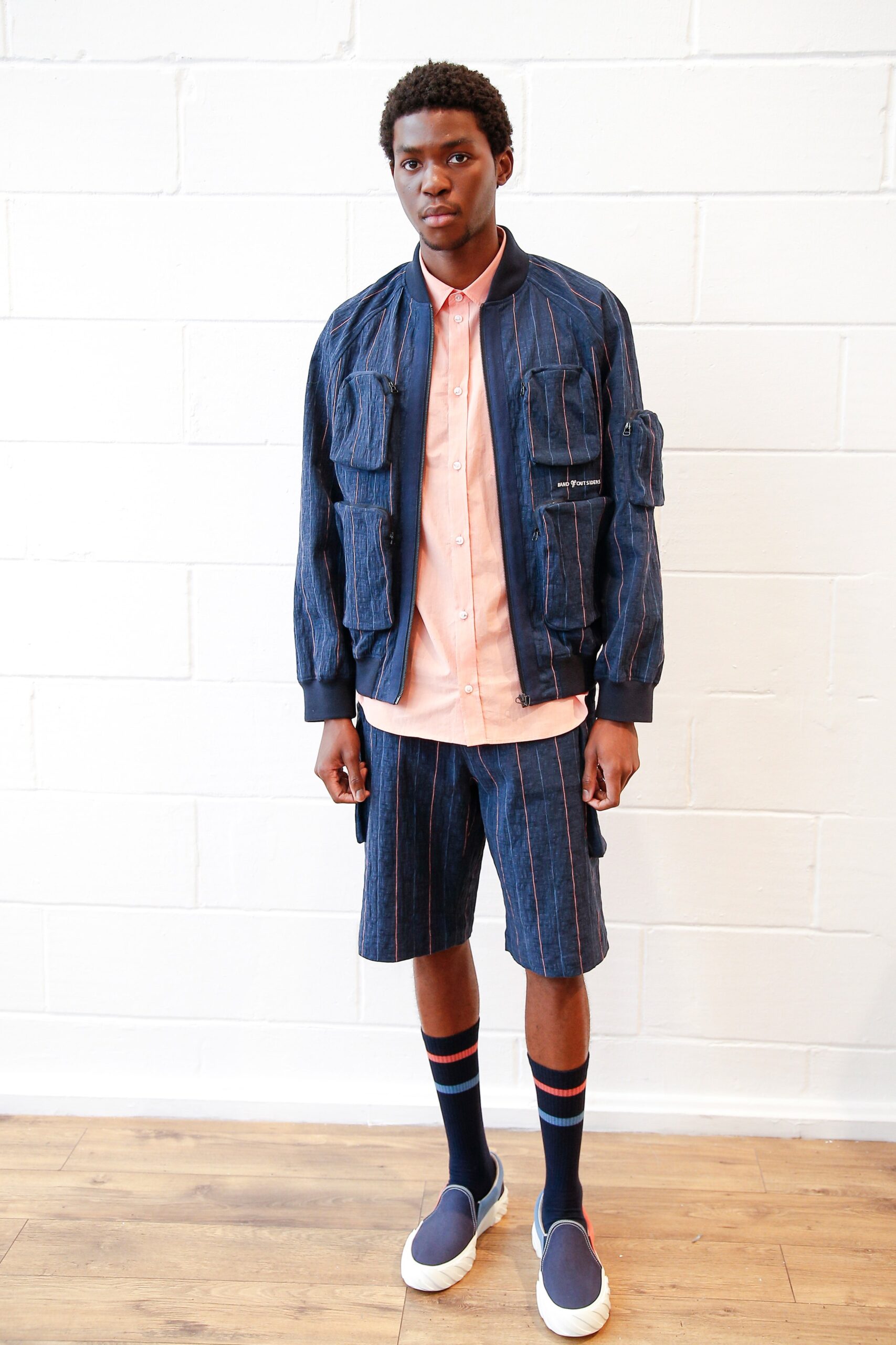 blue denim jacket with pink shirt
