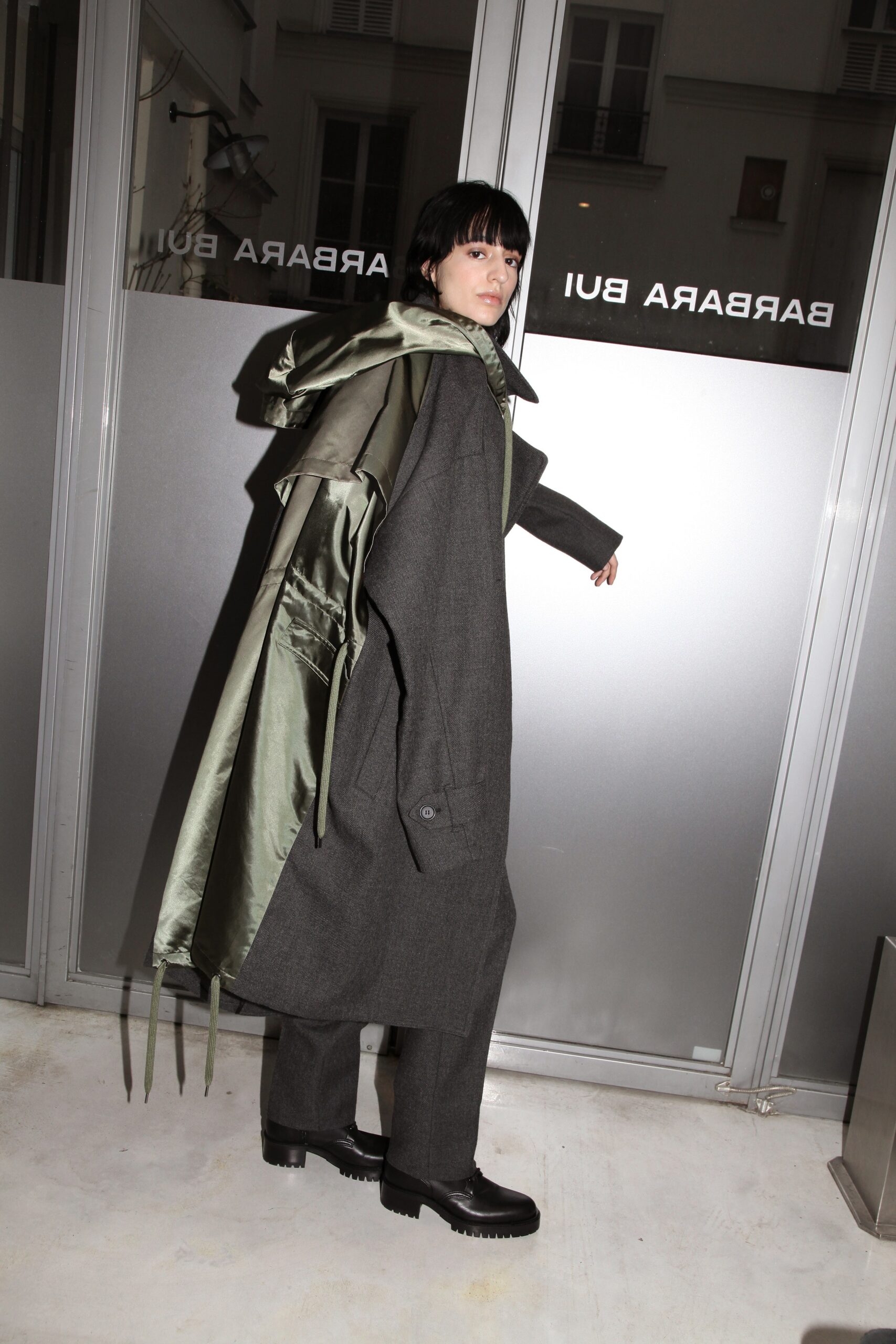gray oversized wool coat with green silk jacket