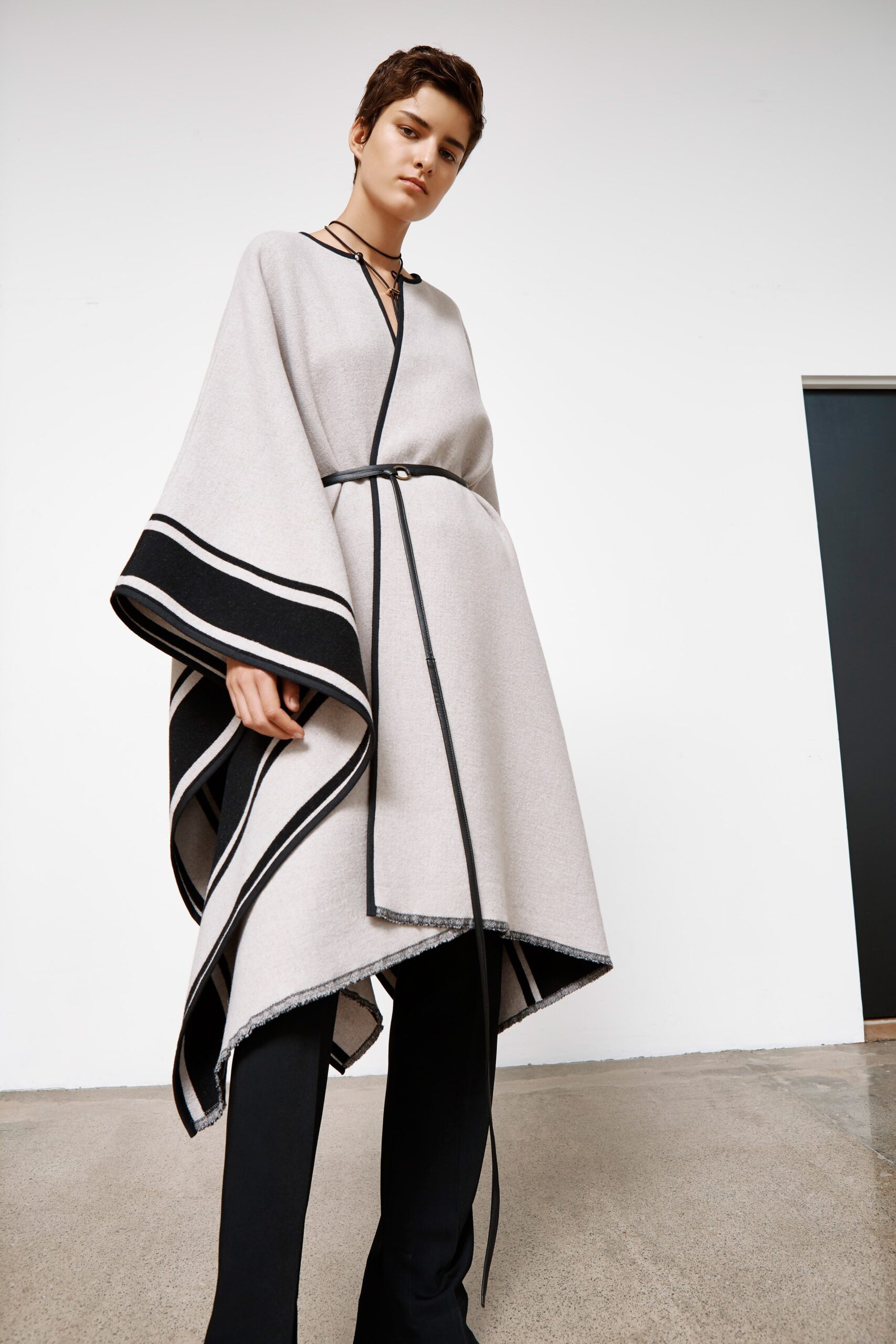 beige wool sleeveless v-neck relaxed layered belted poncho