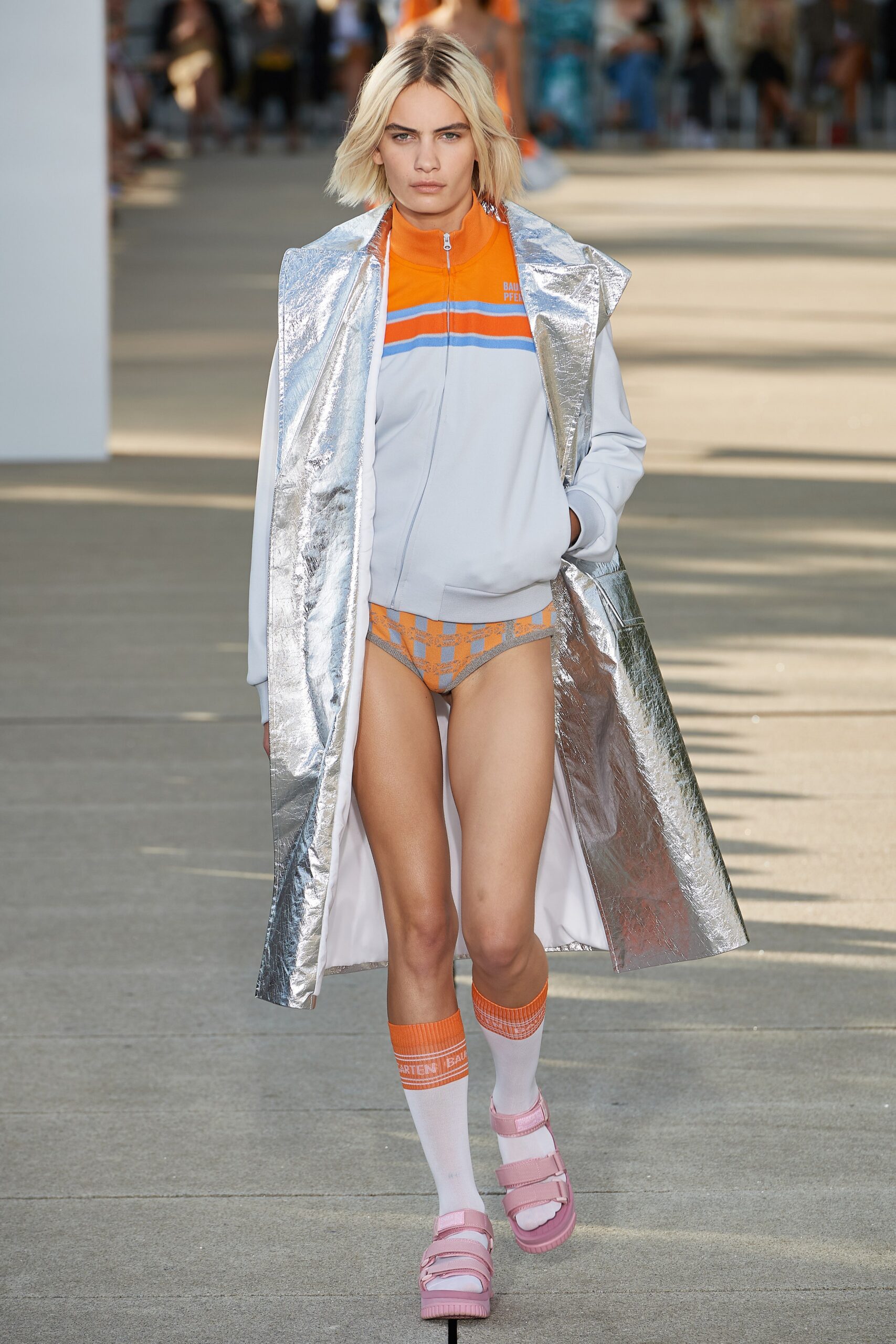 silver vinyl coat with orange top