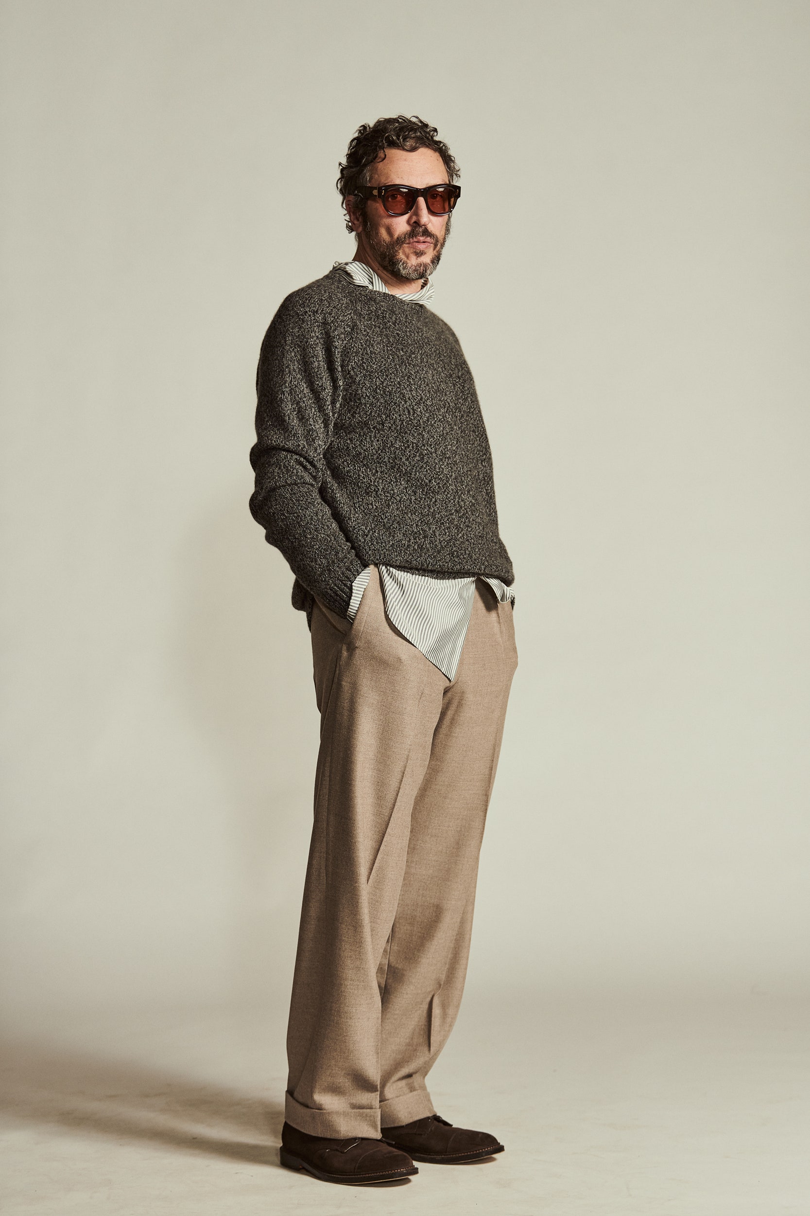 gray wool sweater and beige pants