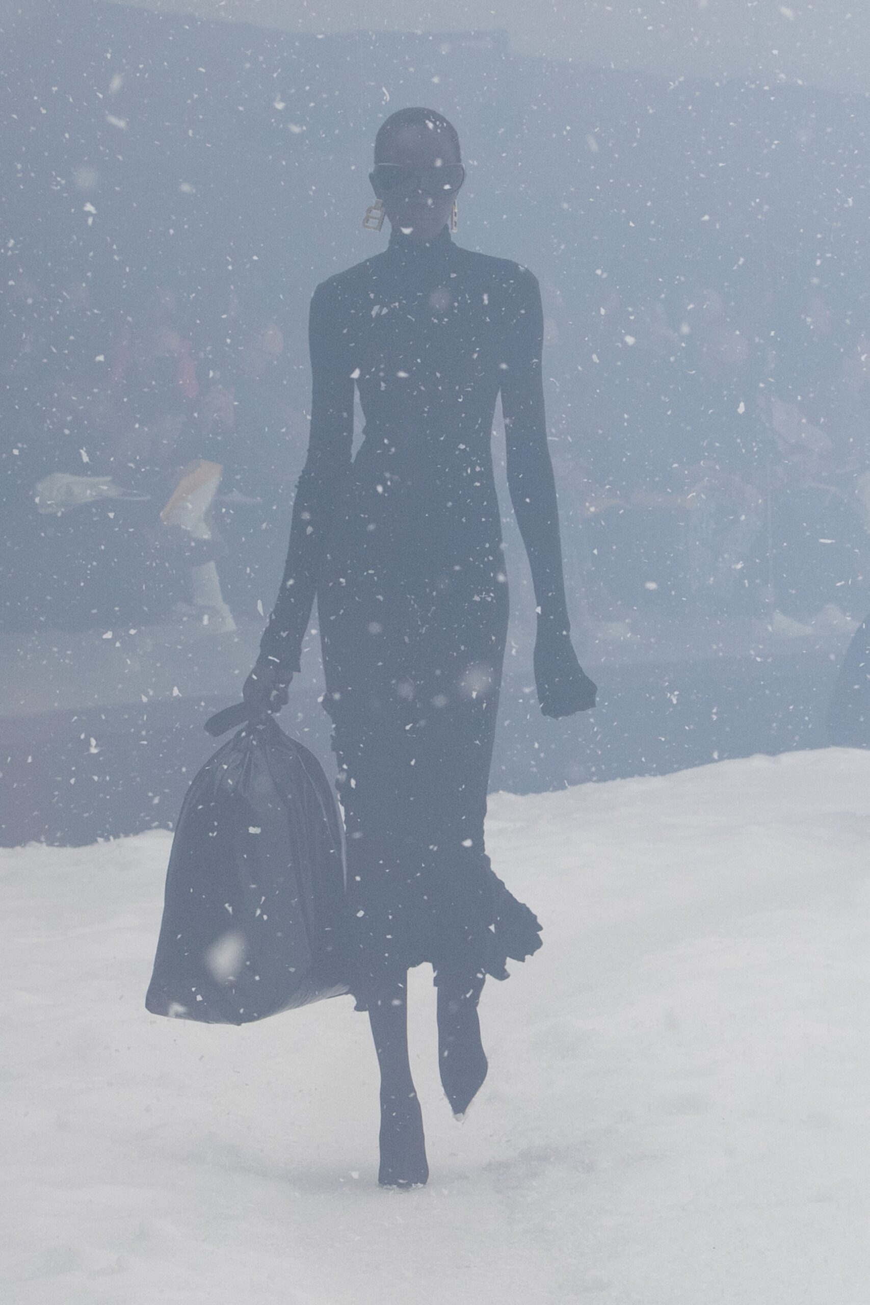 black leather sleeveless dress with bag