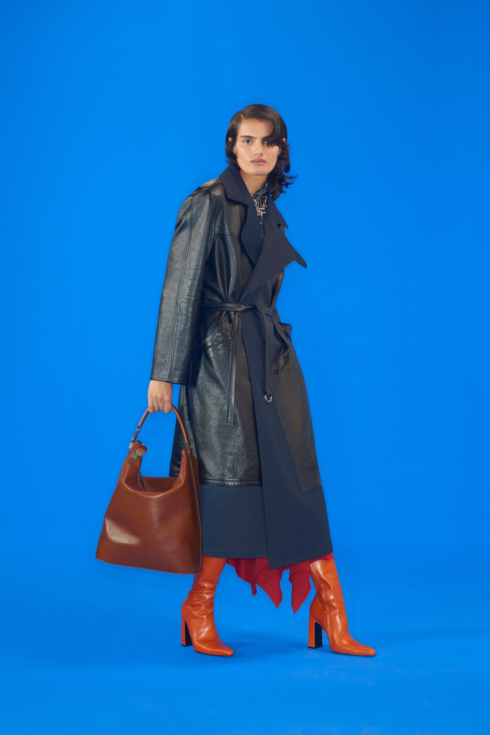 black leather long-sleeve collared fitted belted coat