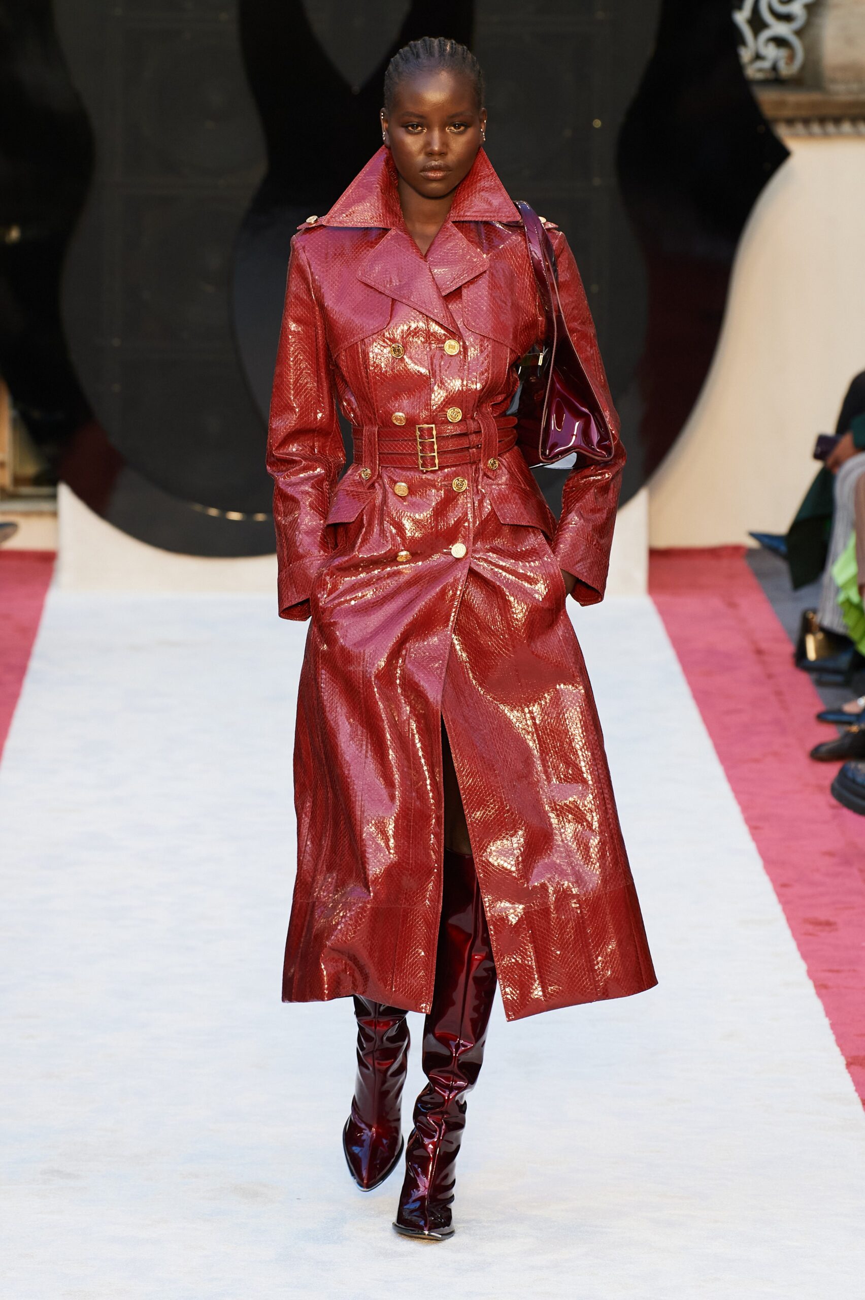 shiny red vinyl trench coat and boots