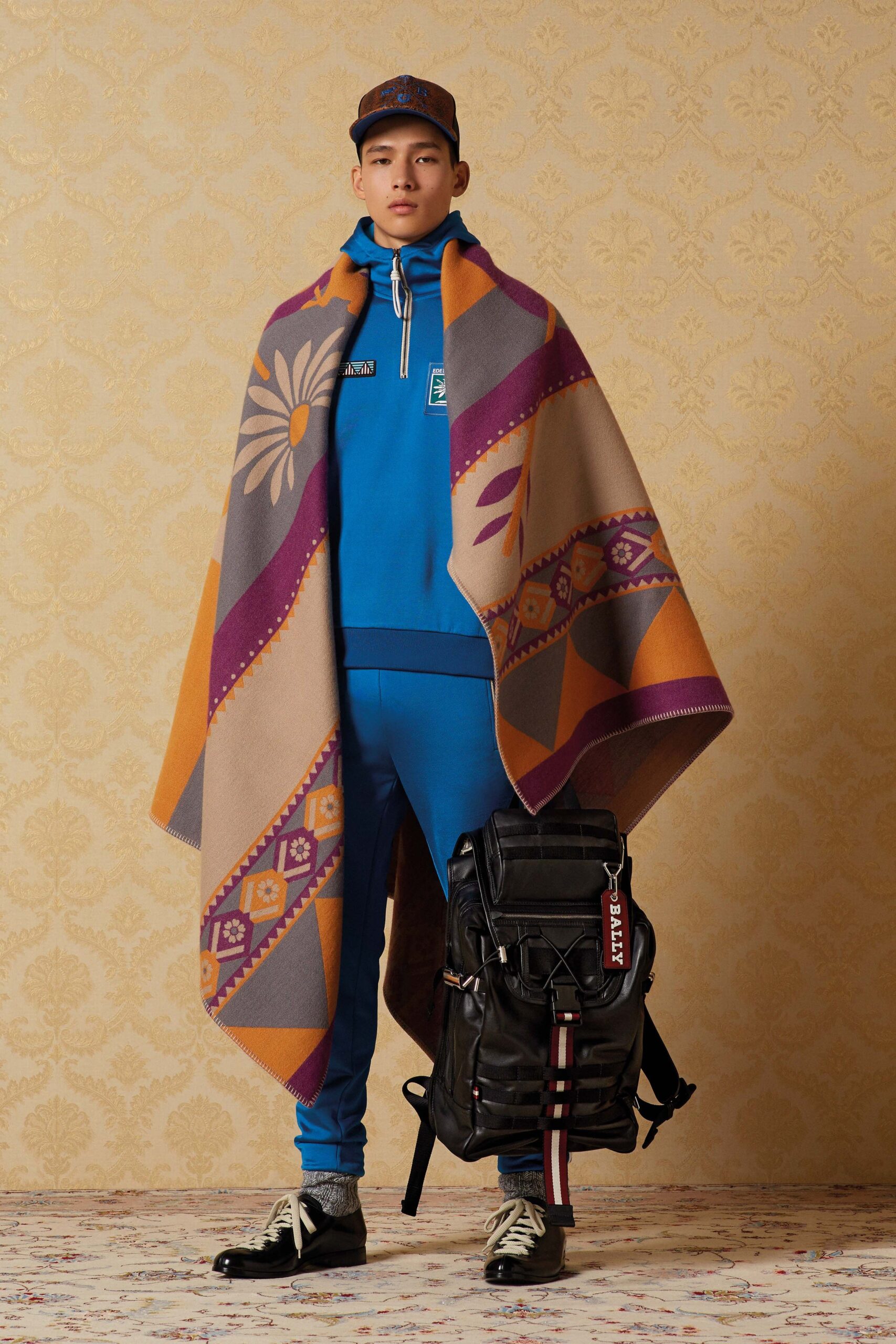 blue sweater with poncho