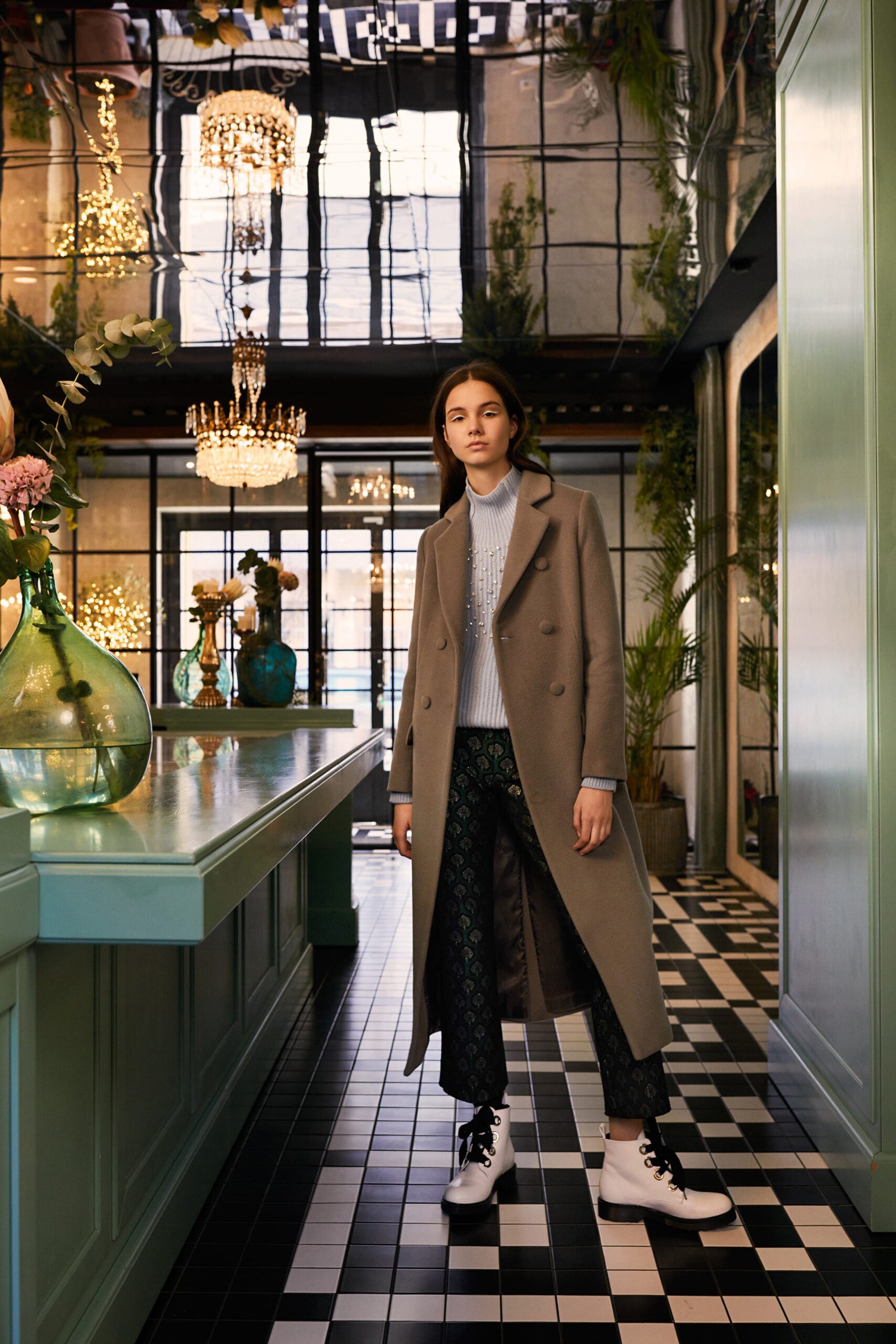 beige wool tailored coat with black pants