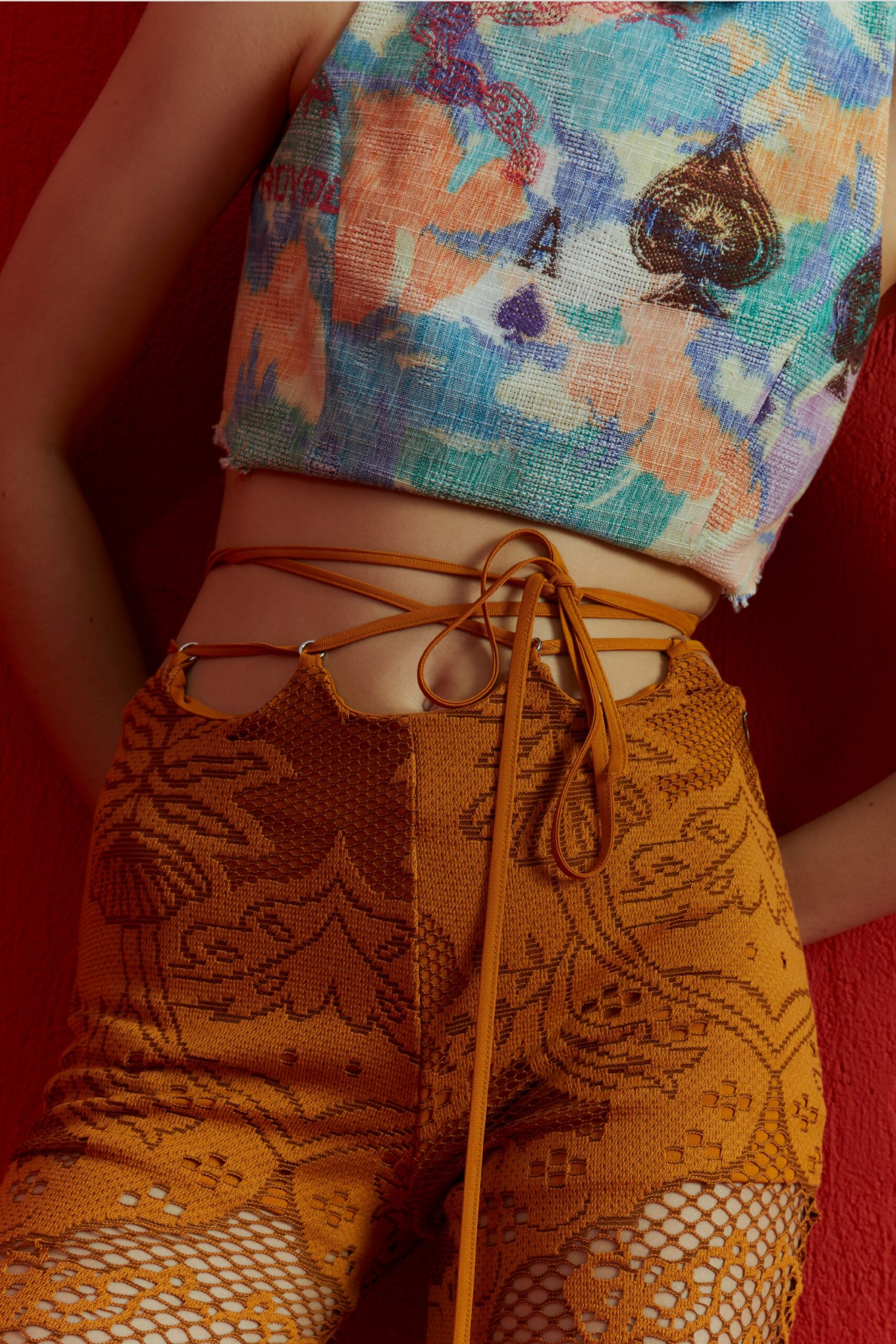 orange openwork high-waisted shorts
