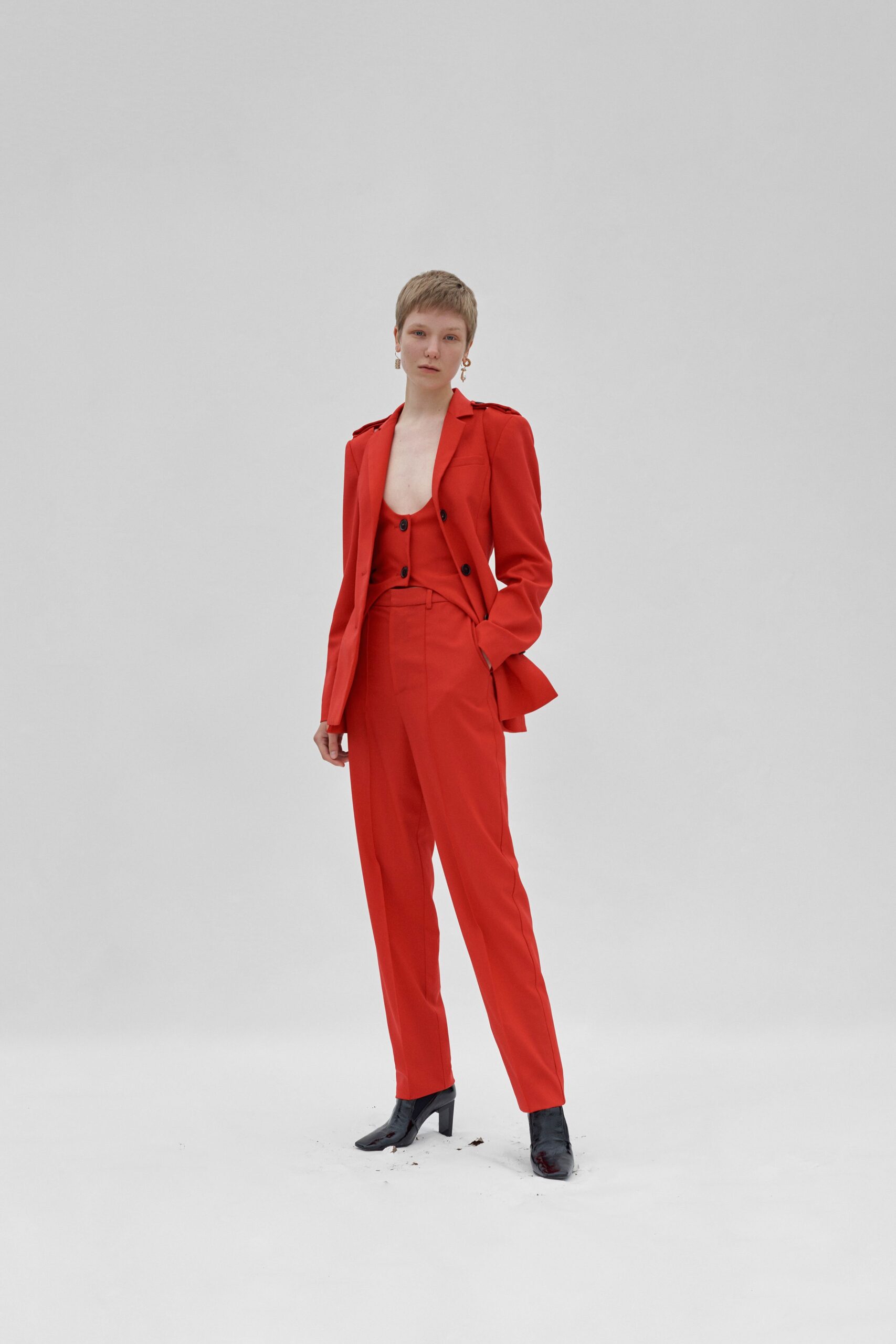 red tailored blazer and pants