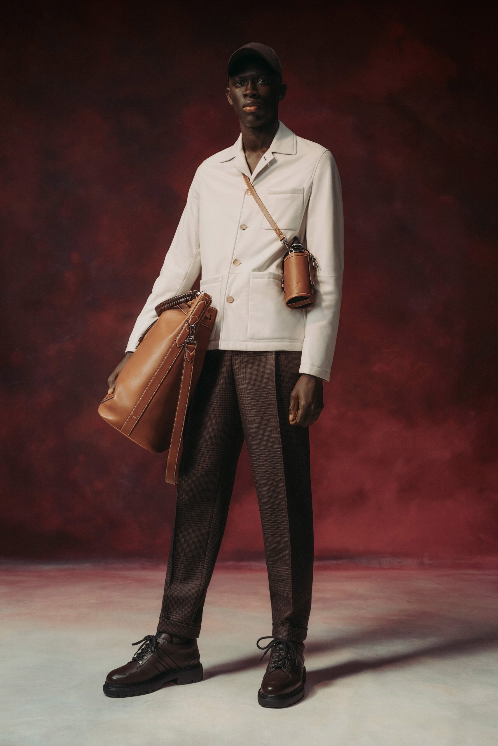 white fitted jacket with brown pants