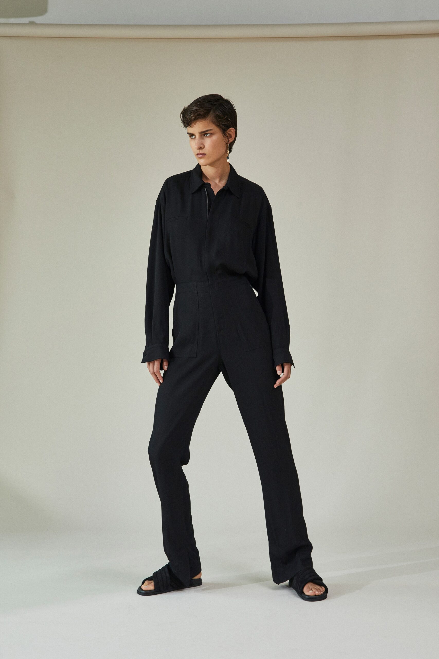 black fitted long-sleeve jumpsuit