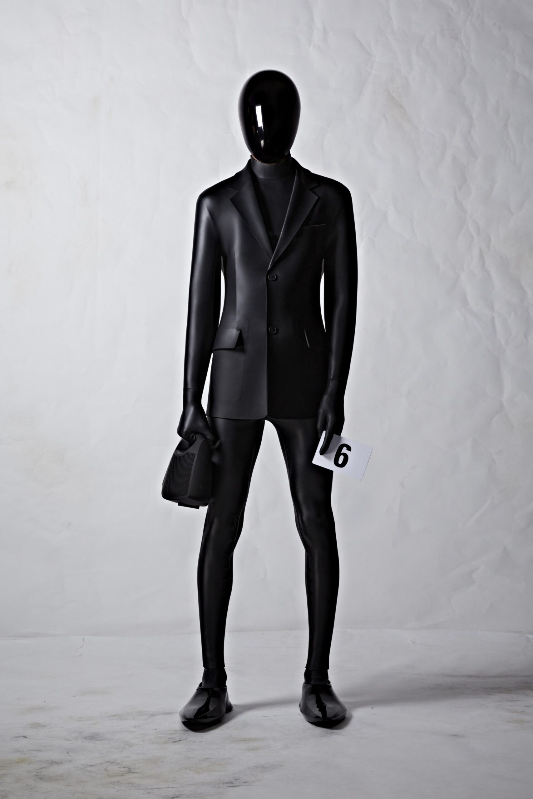 black vinyl fitted suit