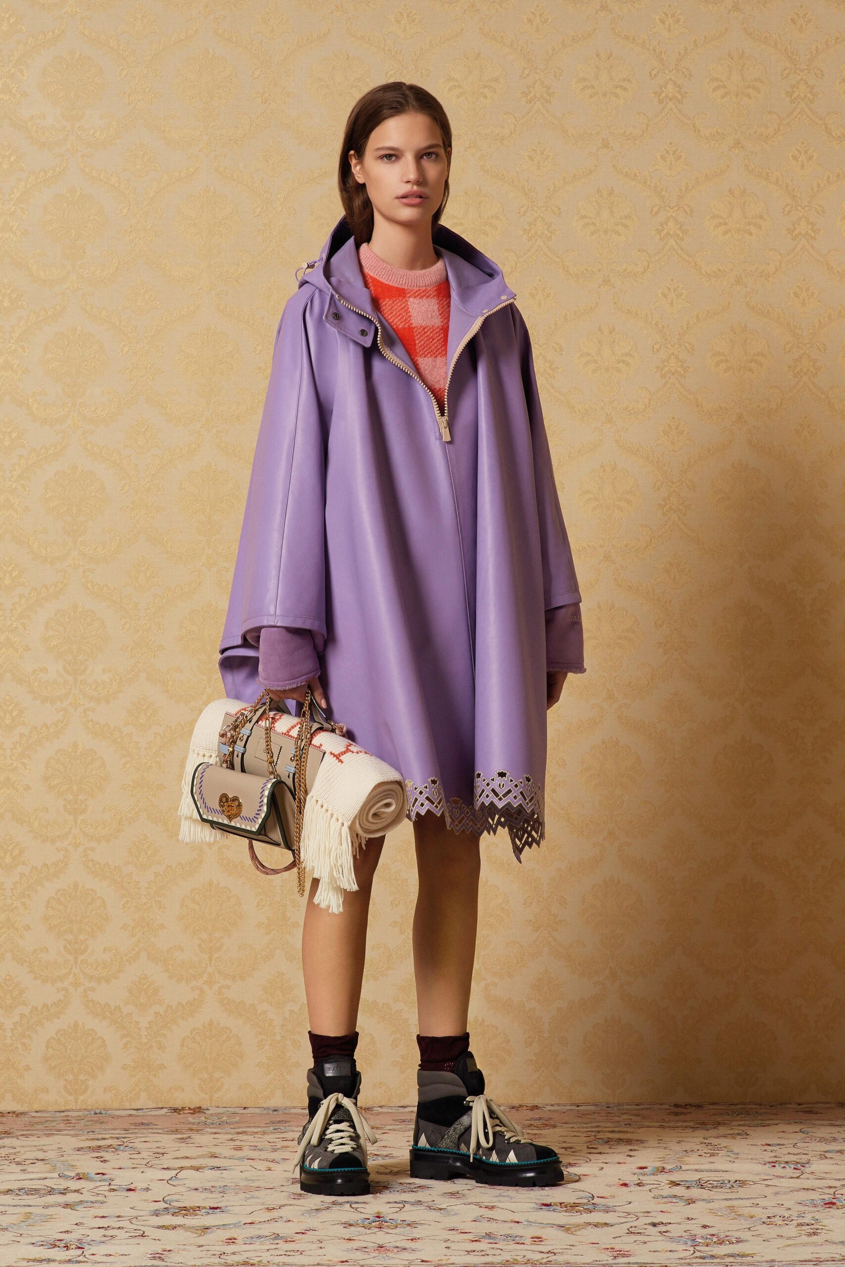 purple vinyl relaxed coat with red top